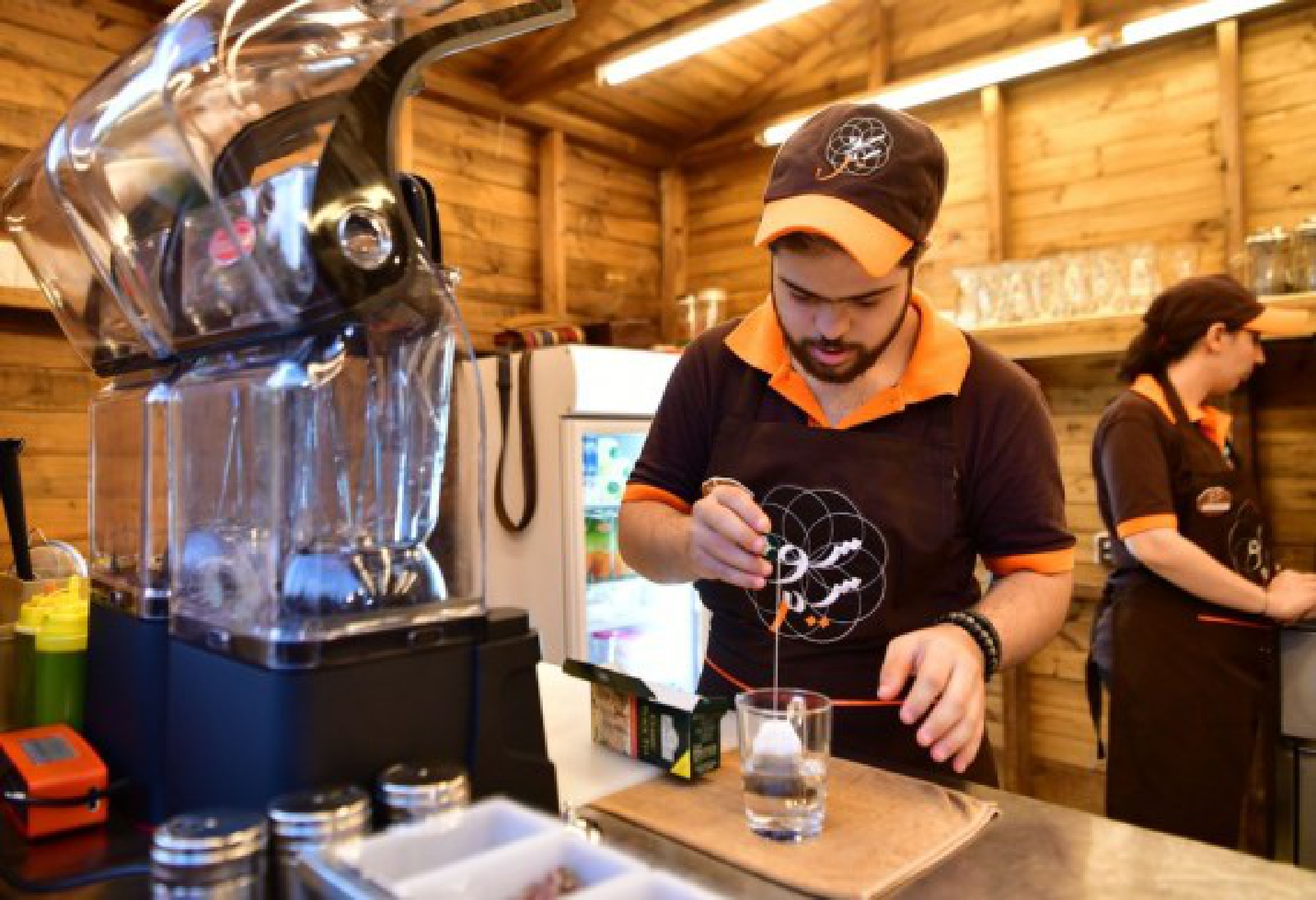 Young Syrians with Down Syndrome work at a cafe called Sucette in the capital Damascus on Aug. 21, 2021.
