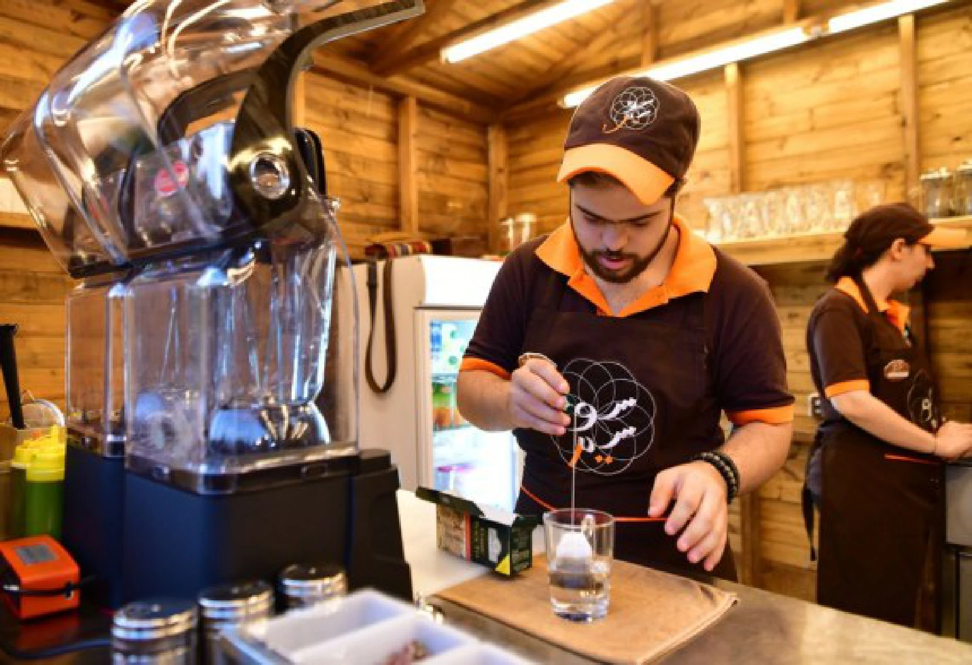 Young Syrians with Down Syndrome work at a cafe called Sucette in the capital Damascus on Aug. 21, 2021.