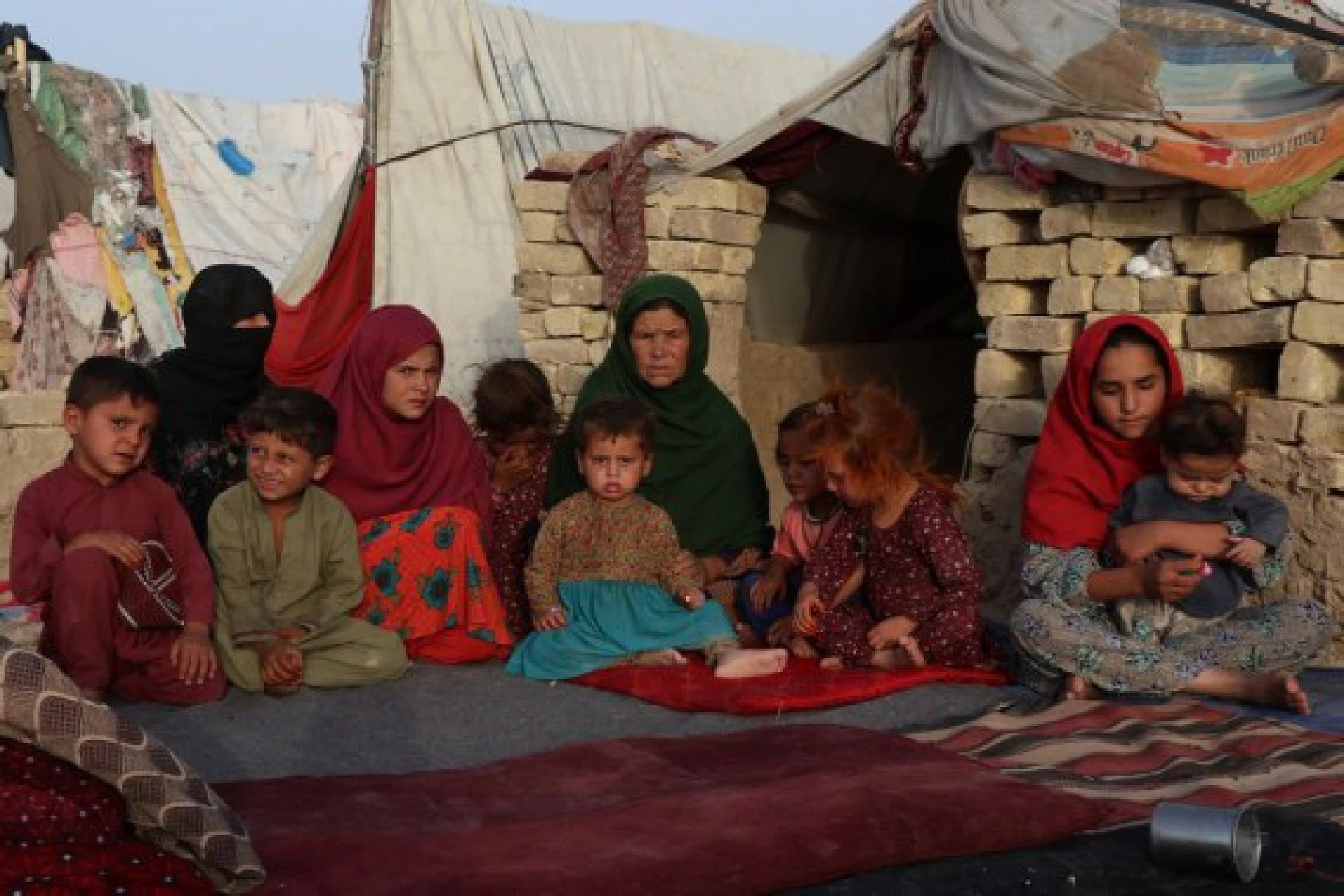 Photo taken on July 31, 2021 shows displaced people at a makeshift camp site in Mazar-i-Sharif, capital of Balkh province, Afghanistan.