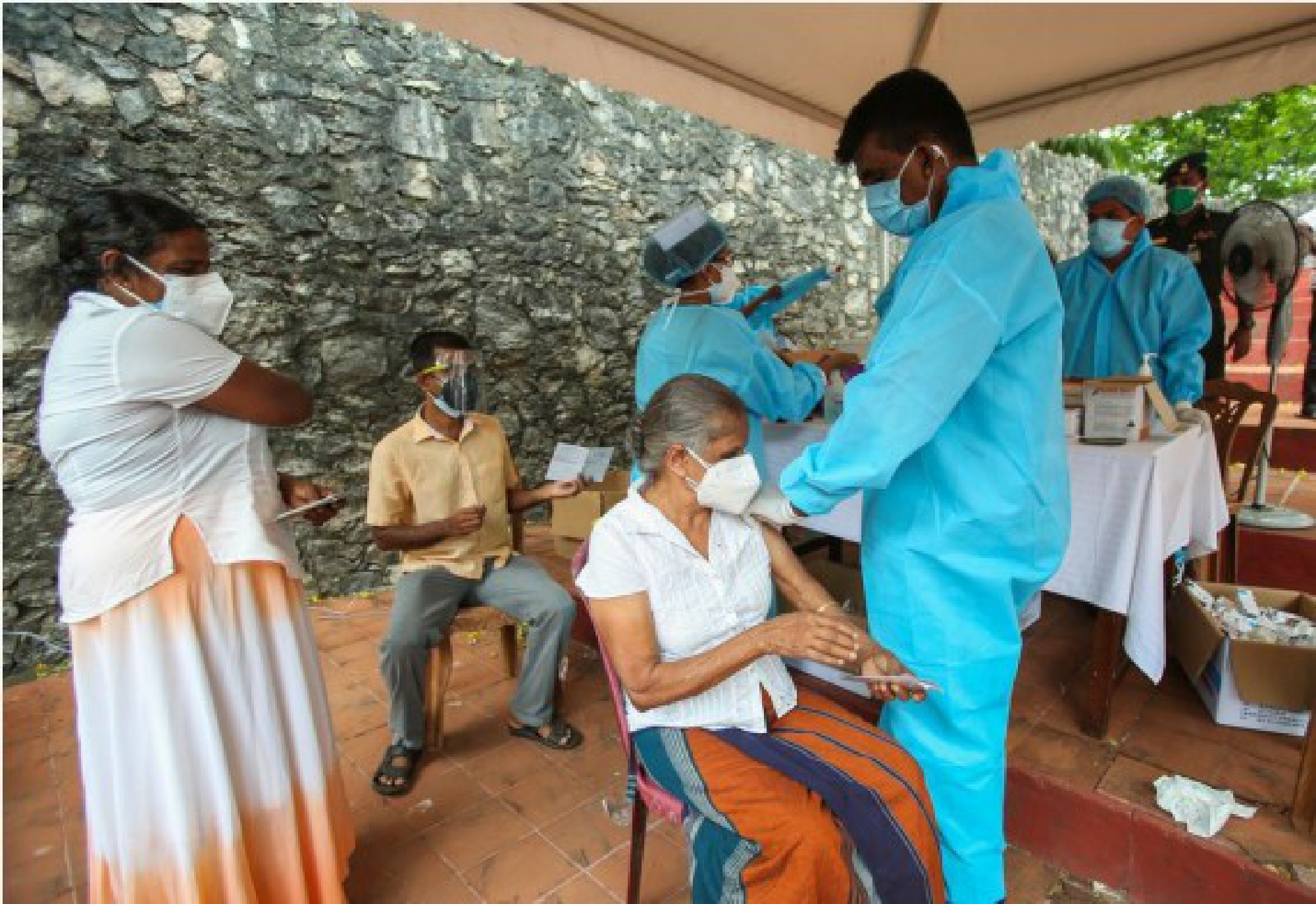 A woman receives the Sinopharm COVID-19 vaccine in Colombo, Sri Lanka, on Aug. 7, 2021.