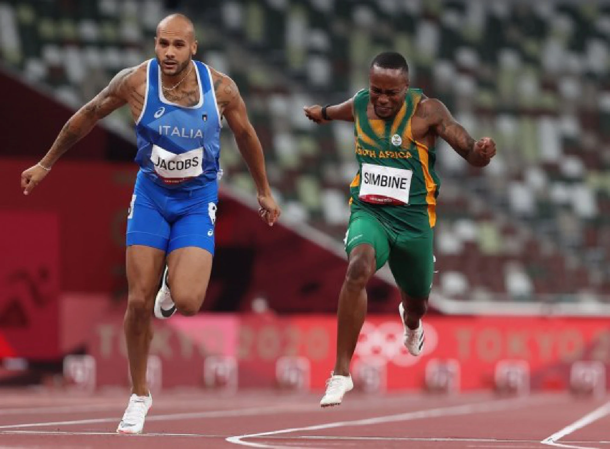 Lamont Marcell Jacobs (L) of Italy wins the men's 100m final on Aug. 1, 2021.