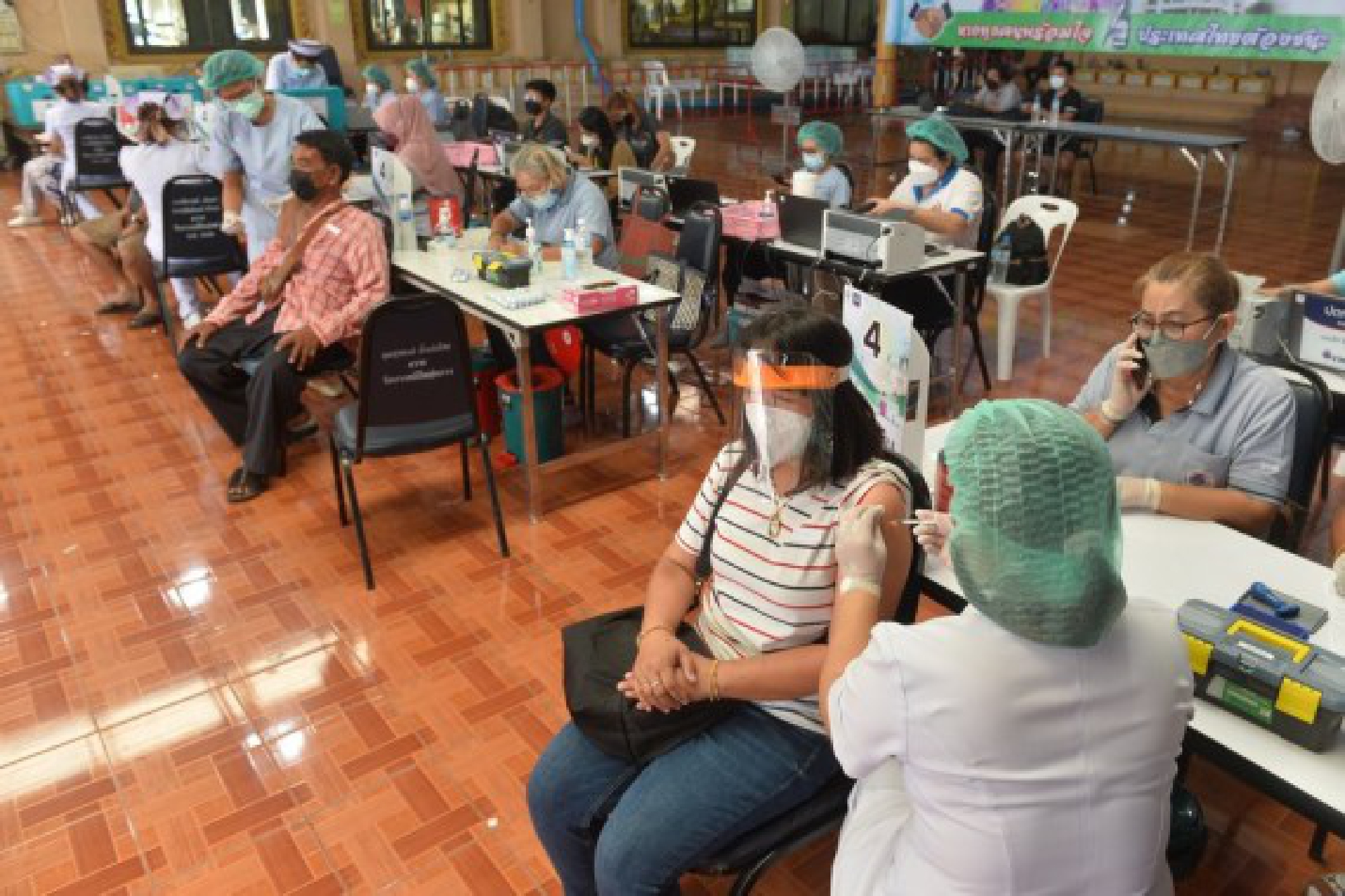Citizens receive COVID-19 vaccines in Bangkok, Thailand, July 15, 2021. 