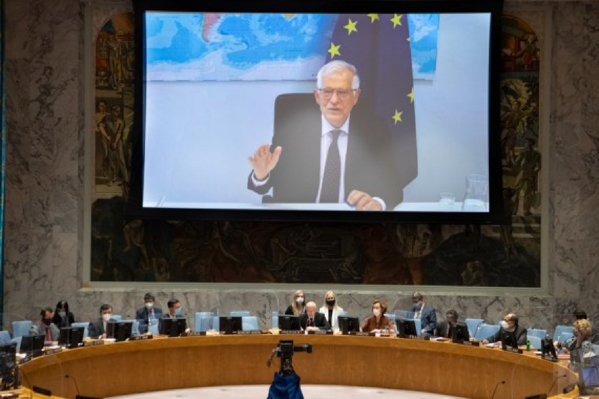 Josep Borrell, the foreign policy chief of the European Union (on screen) addresses a Security Council meeting on UN-EU cooperation via video link at the UN headquarters in New York, June 10, 2021. 