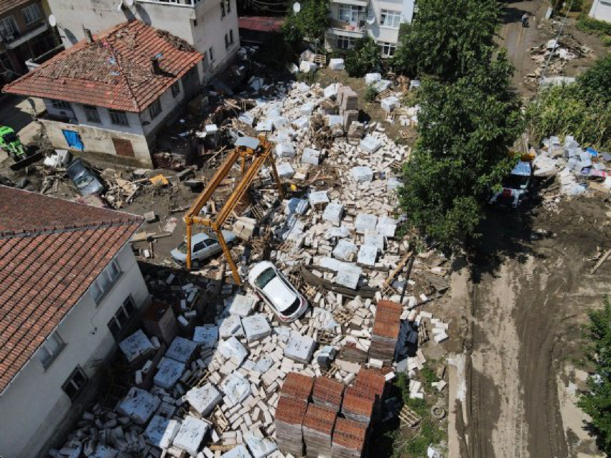 Aerial photo taken on Aug. 15, 2021 shows the debris left by flooding in the  flood-hit area in the town of Abana, Kastamonu province, Turkey.
