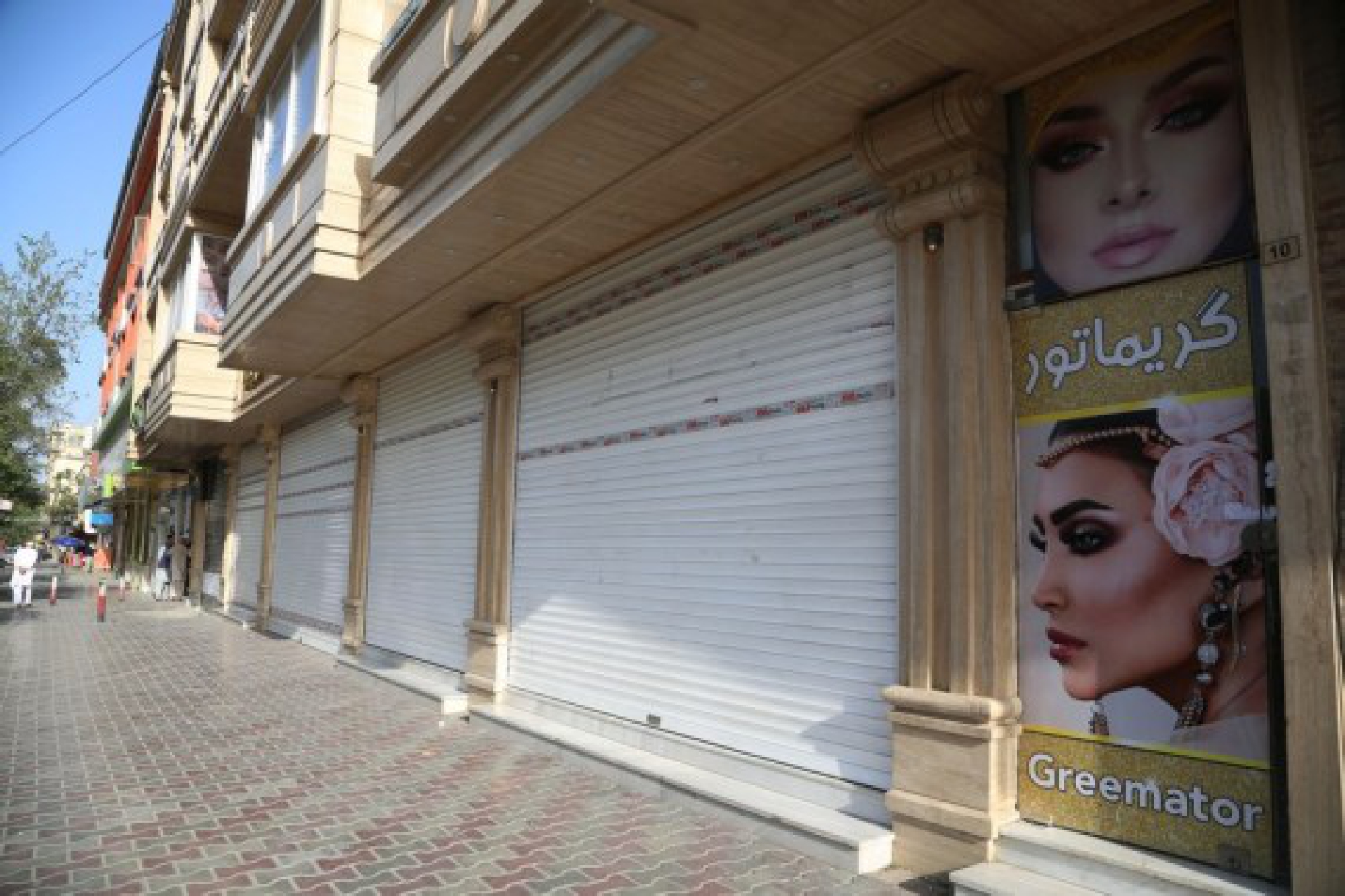 Photo taken on Aug. 15, 2021 shows closed shops in Kabul, capital of Afghanistan.  