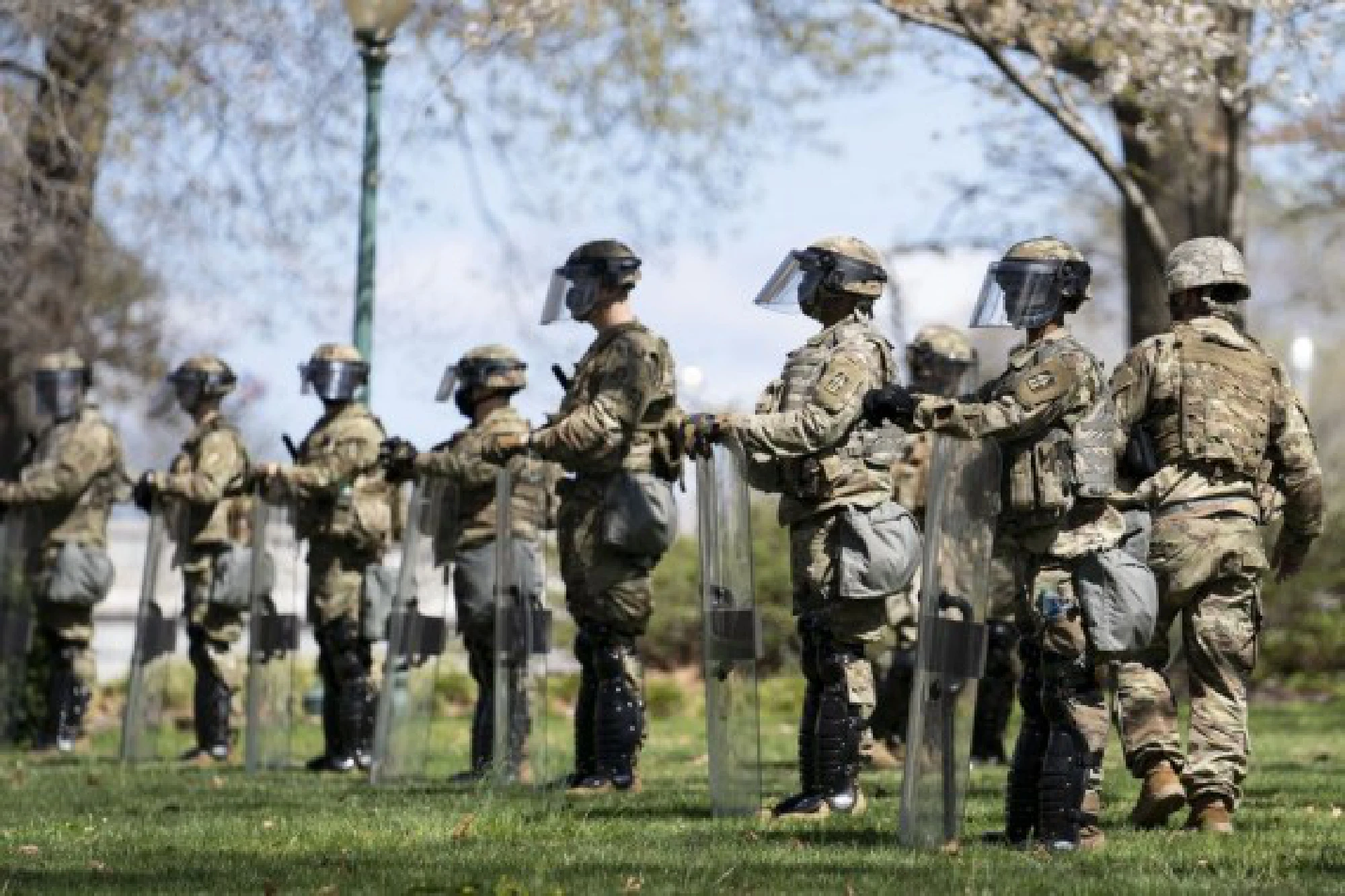 U.S. National Guard members stand guard in front of the U.S. Capitol building in Washington, D.C., the United States, on April 2, 2021. 