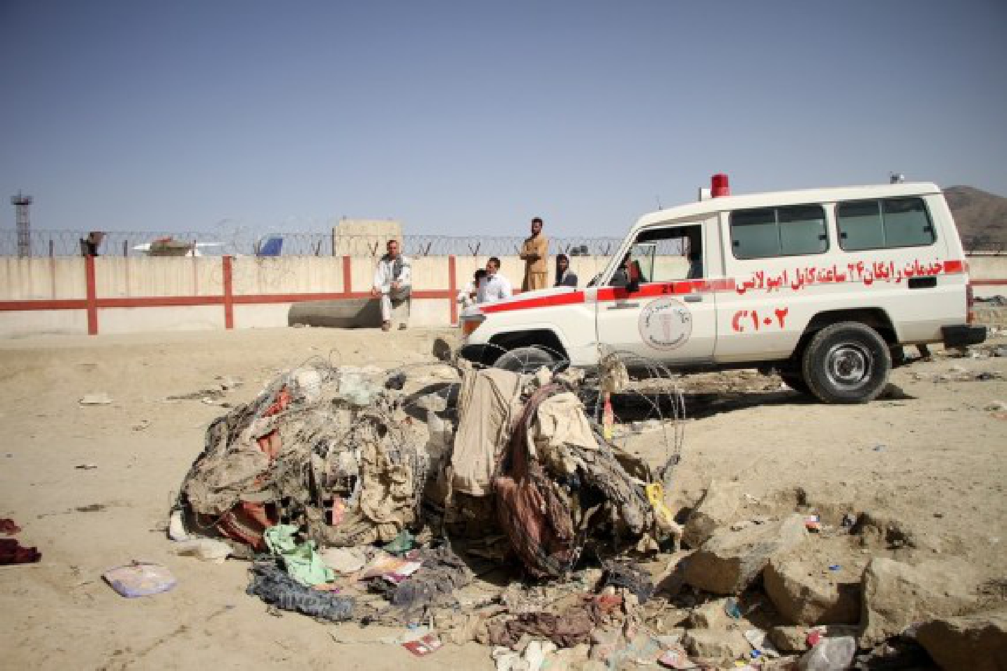 An ambulance is seen at the explosion site near the Kabul airport in Afghanistan, Aug. 27, 2021. 