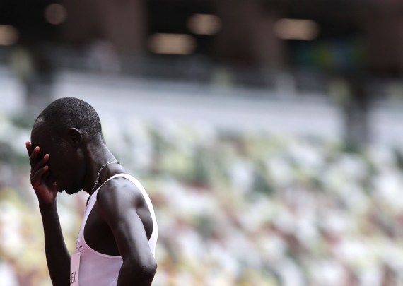 James Nyang Chiengjiek of the Refugee Olympic Team (EOR) reacts after falling down during the men's 800m heat at Tokyo 2020 Olympic Games, in Tokyo, Japan, July 31, 2021.