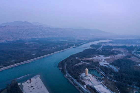 Aerial photo taken on Dec. 16, 2020 shows the view of the Yellow River in Guide County of the Tibetan Autonomous Prefecture of Hainan, northwest China's Qinghai Province