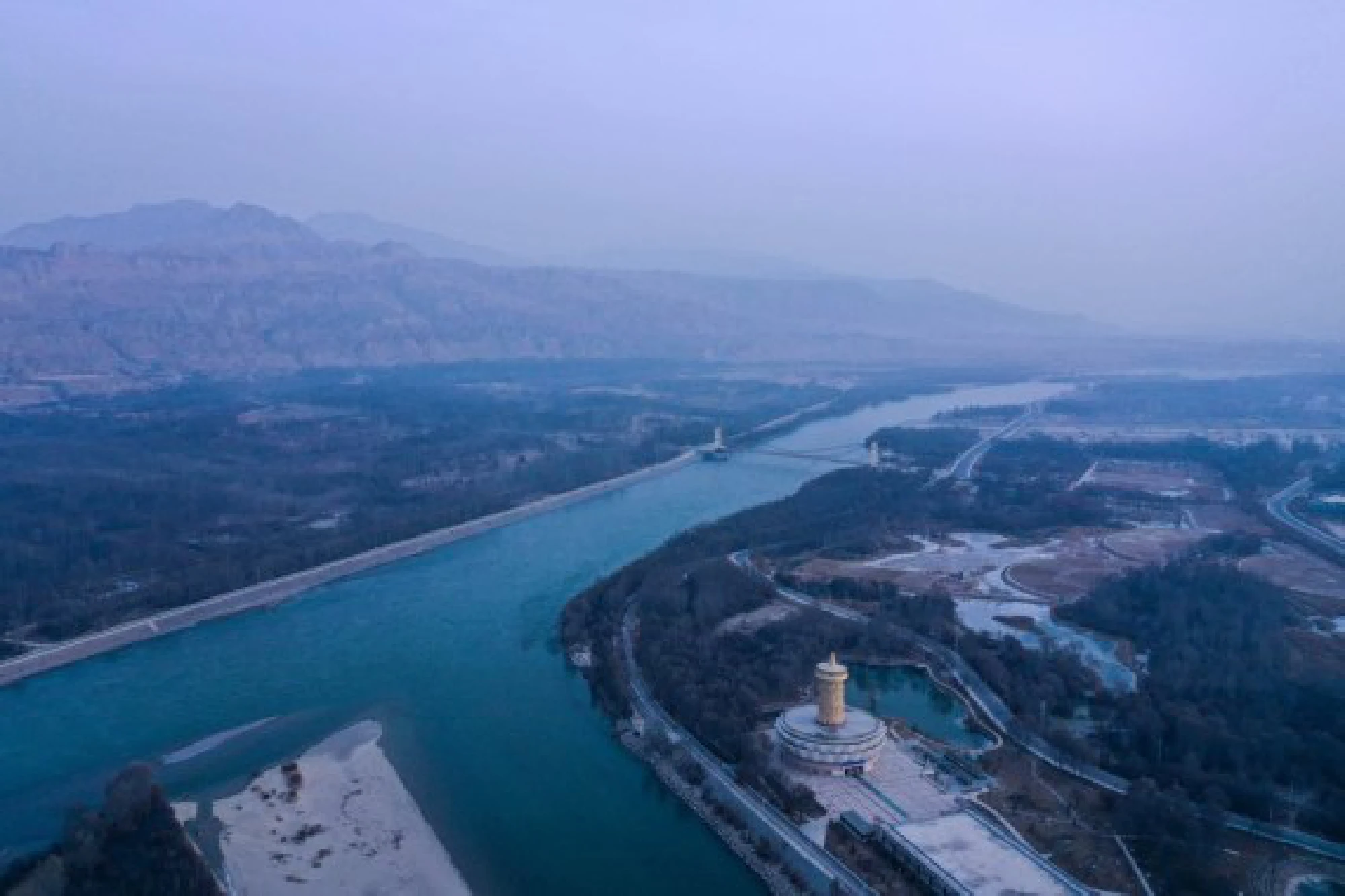 Aerial photo taken on Dec. 16, 2020 shows the view of the Yellow River in Guide County of the Tibetan Autonomous Prefecture of Hainan, northwest China's Qinghai Province