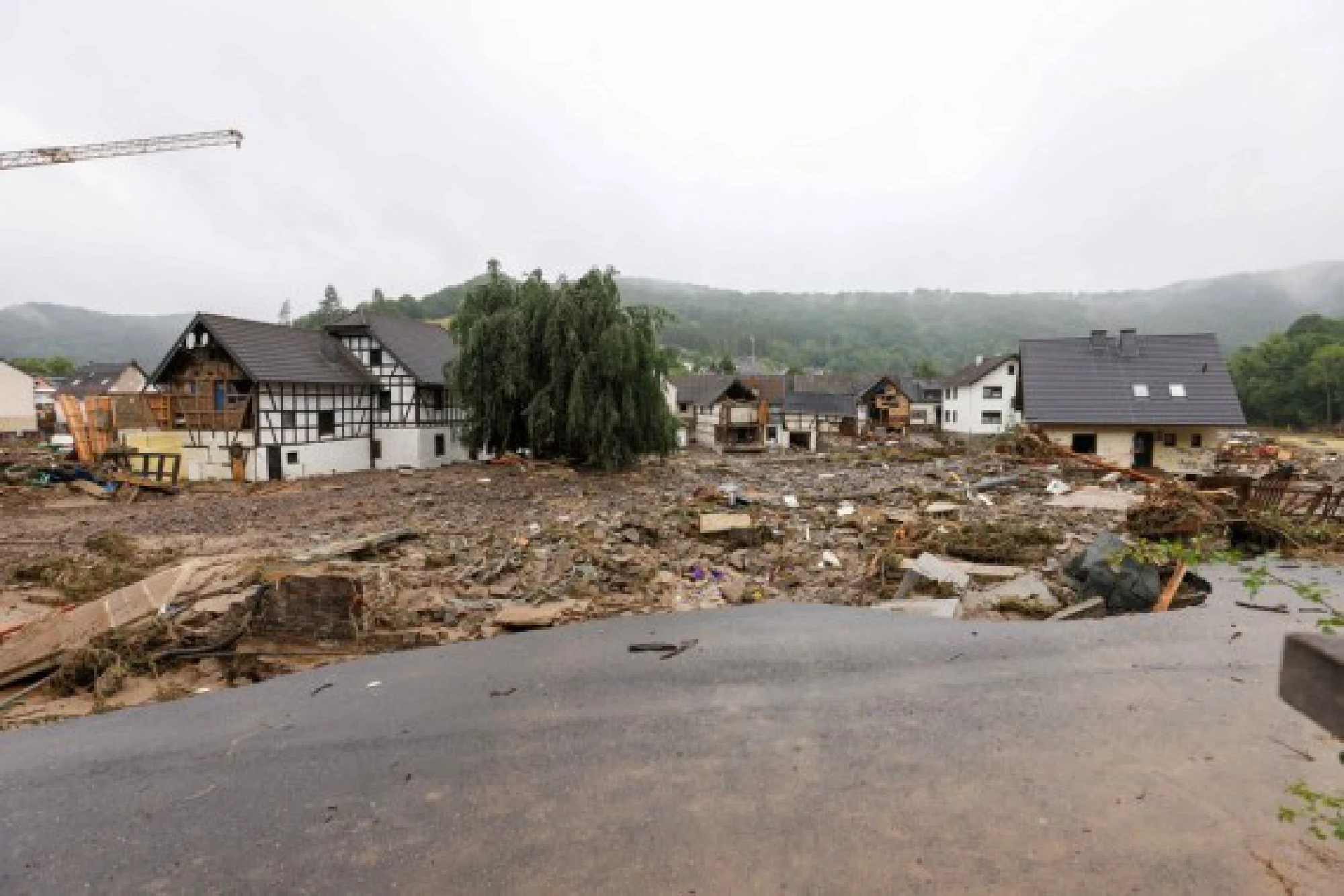 Photo taken on July 16, 2021 shows roads and houses damaged in flood disaster in Schuld, a town in Ahrweiler, 