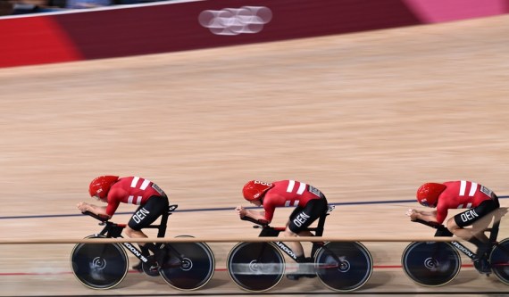 Silver medalists Cyclists of Danmark compete during cycling track men's team pursuit final at Tokyo 2020 Olympic Games, in Izu, Japan, Aug. 4, 2021.