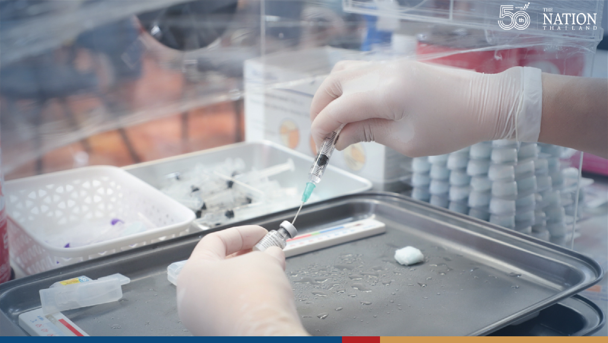 Long queue fails to deter elderly seeking Pfizer vaccine in Samut Prakan