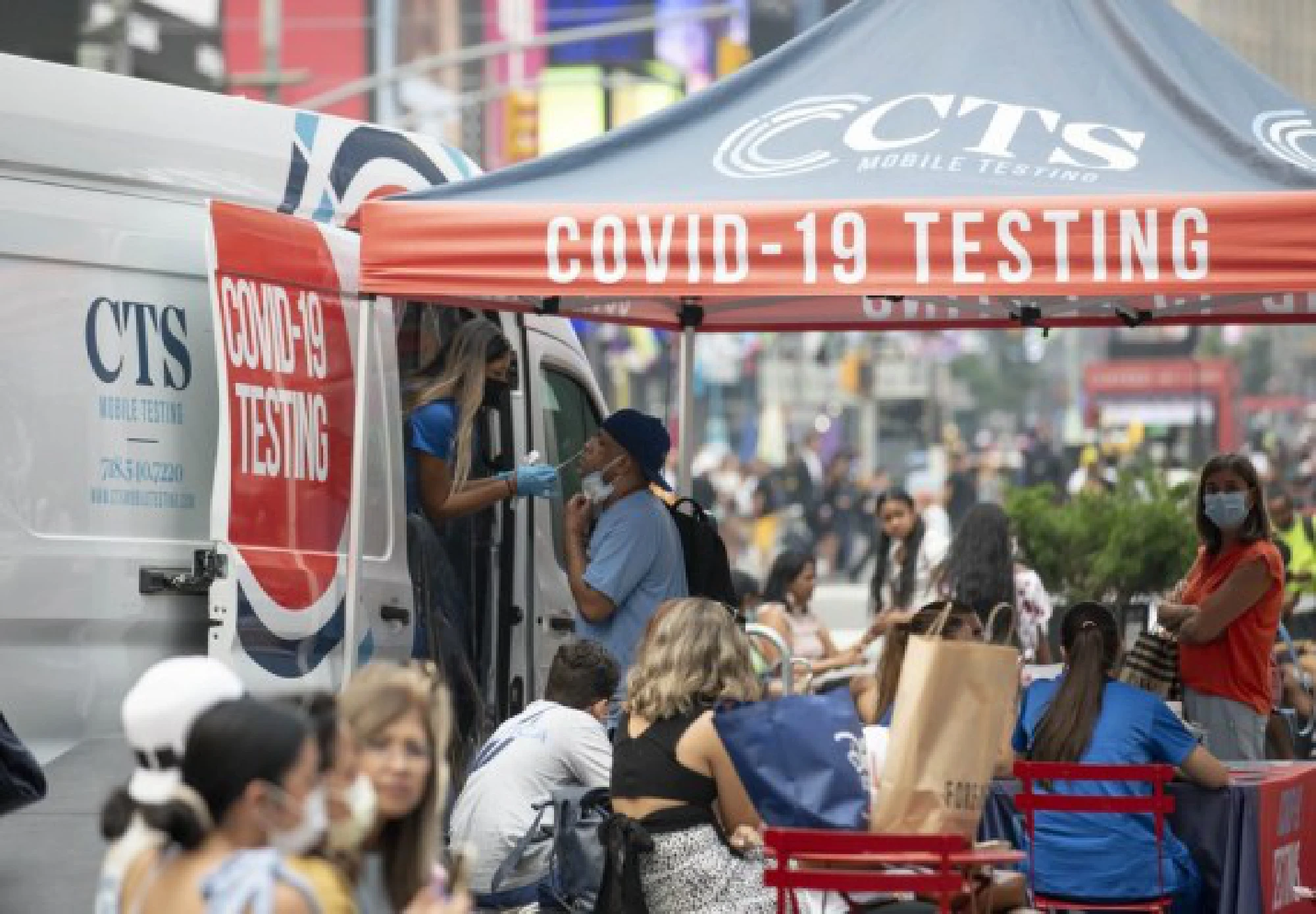 A man receives COVID-19 test at a mobile testing site in Times Square, New York, the United States, on July 20, 2021.