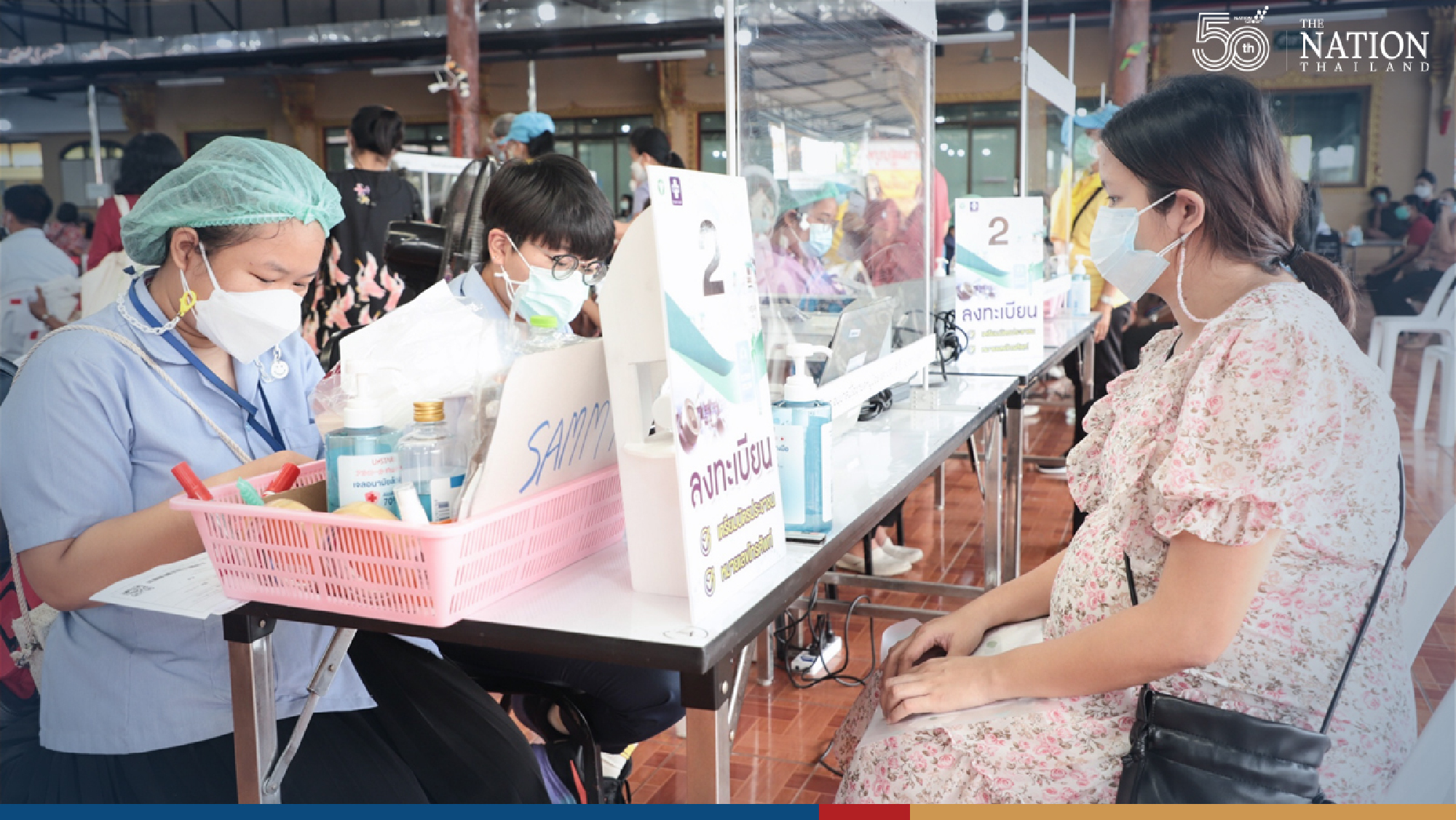 Long queue fails to deter elderly seeking Pfizer vaccine in Samut Prakan