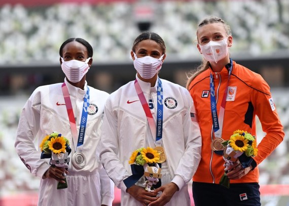 Sydney McLaughlin (C) and Dalilah Muhammad (L) of the United States and Femke Bol of the Netherlands at the awarding ceremony of the women's 400m hurdles final at the Tokyo 2020 Olympic Games in Tokyo, Japan, Aug. 4, 2021. 