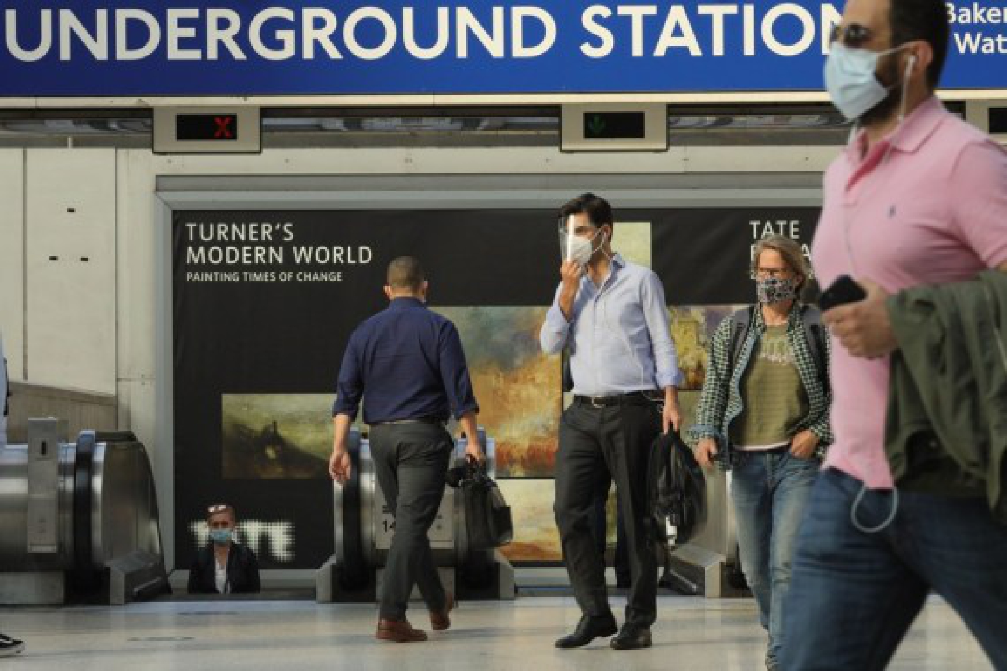  Passengers walk at Waterloo train station in London, Britain, on Aug. 5, 2021. 