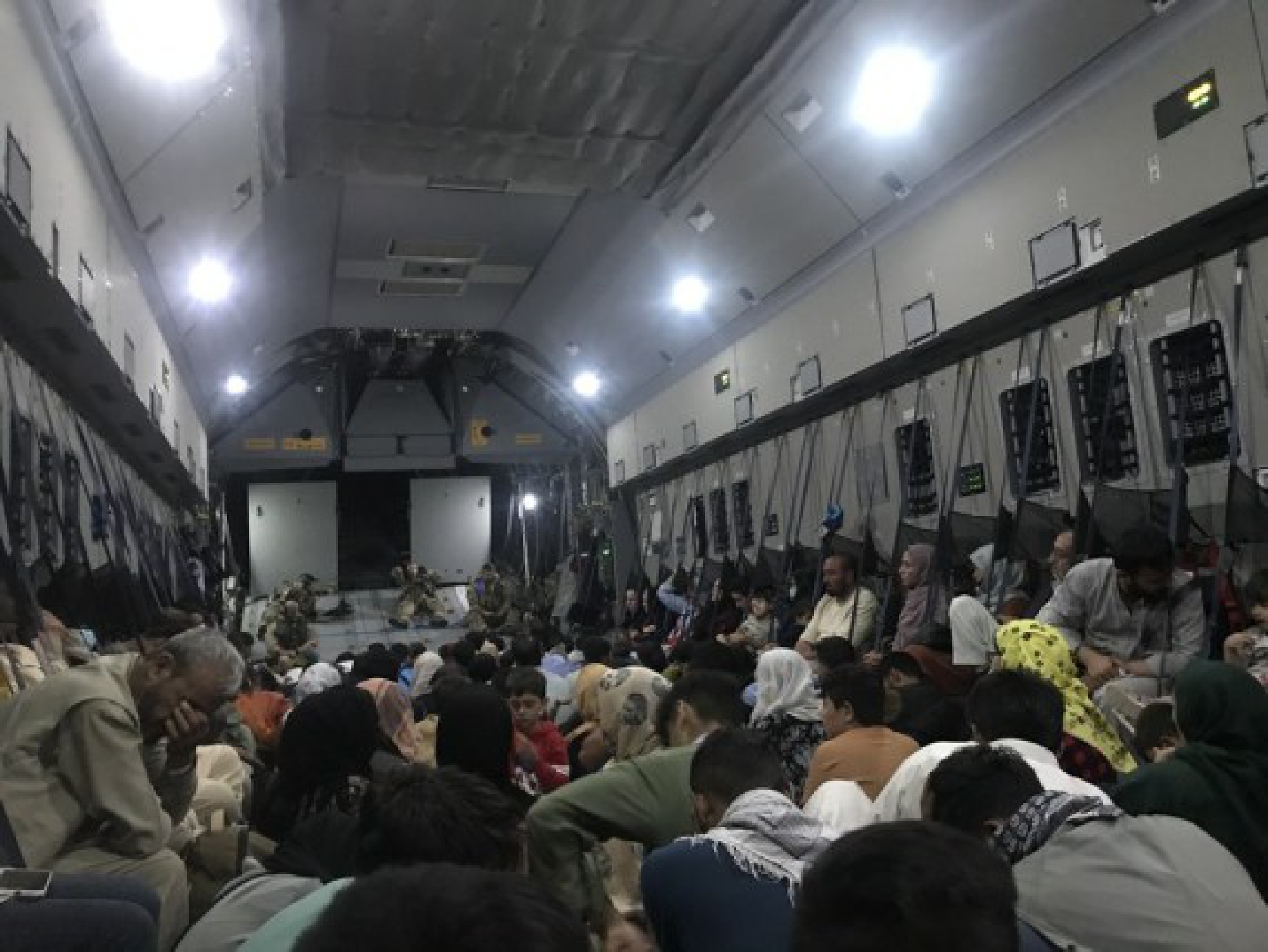 People take a military aircraft of Germany to leave Kabul, Afghanistan, Aug. 24, 2021.