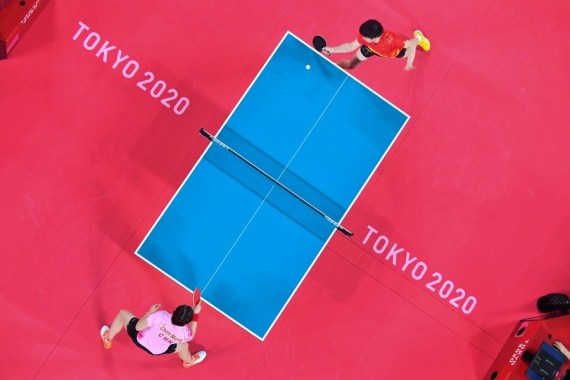 China's Chen Meng competes against her teammate Sun Yingsha (up) during the women's singles final of the table tennis competition at Tokyo 2020 Olympic Games in Tokyo, Japan, July 29, 2021. 