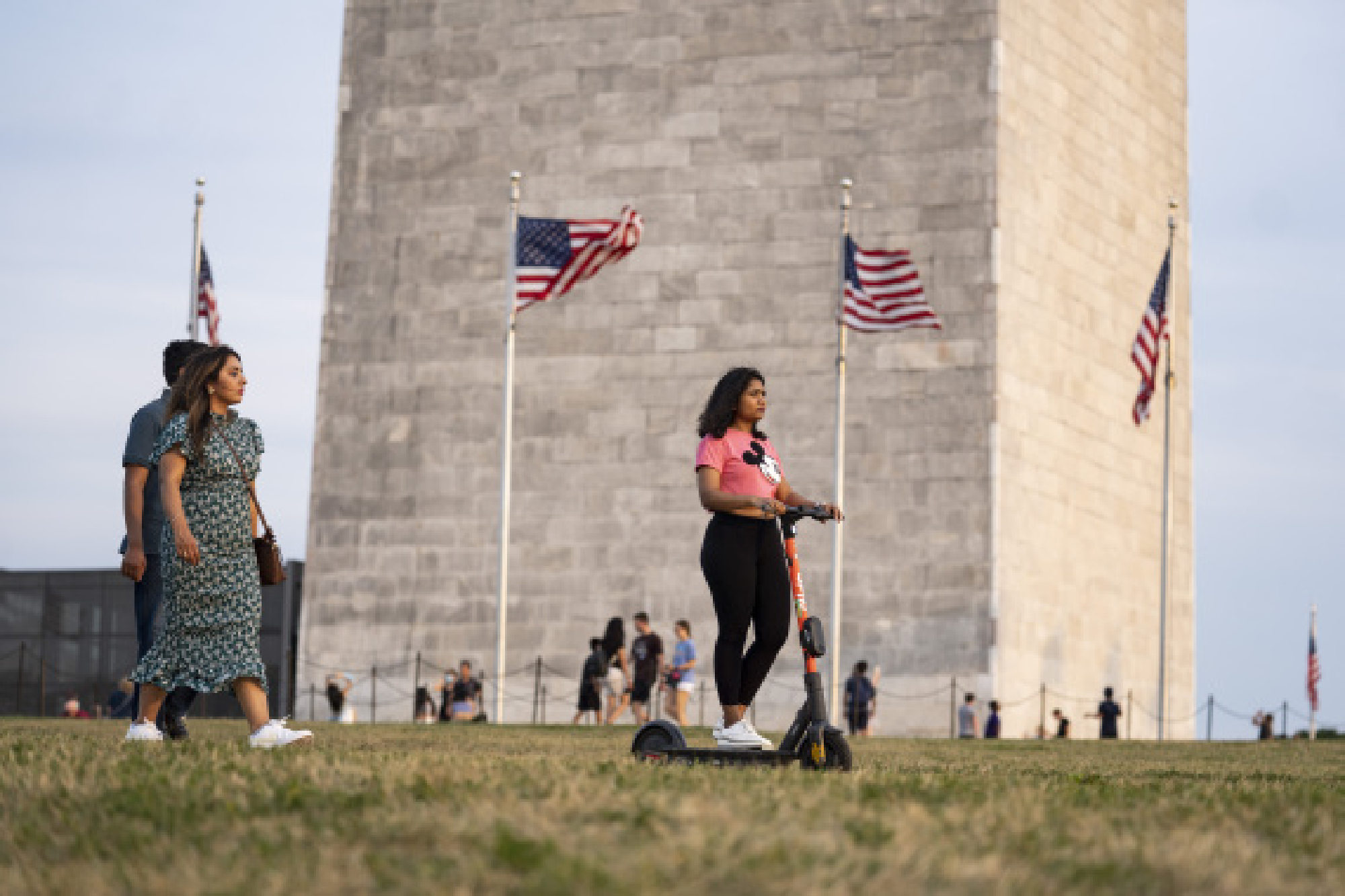 People visit the Washington Monument in Washington, D.C., the United States, on Aug. 6, 2021. 