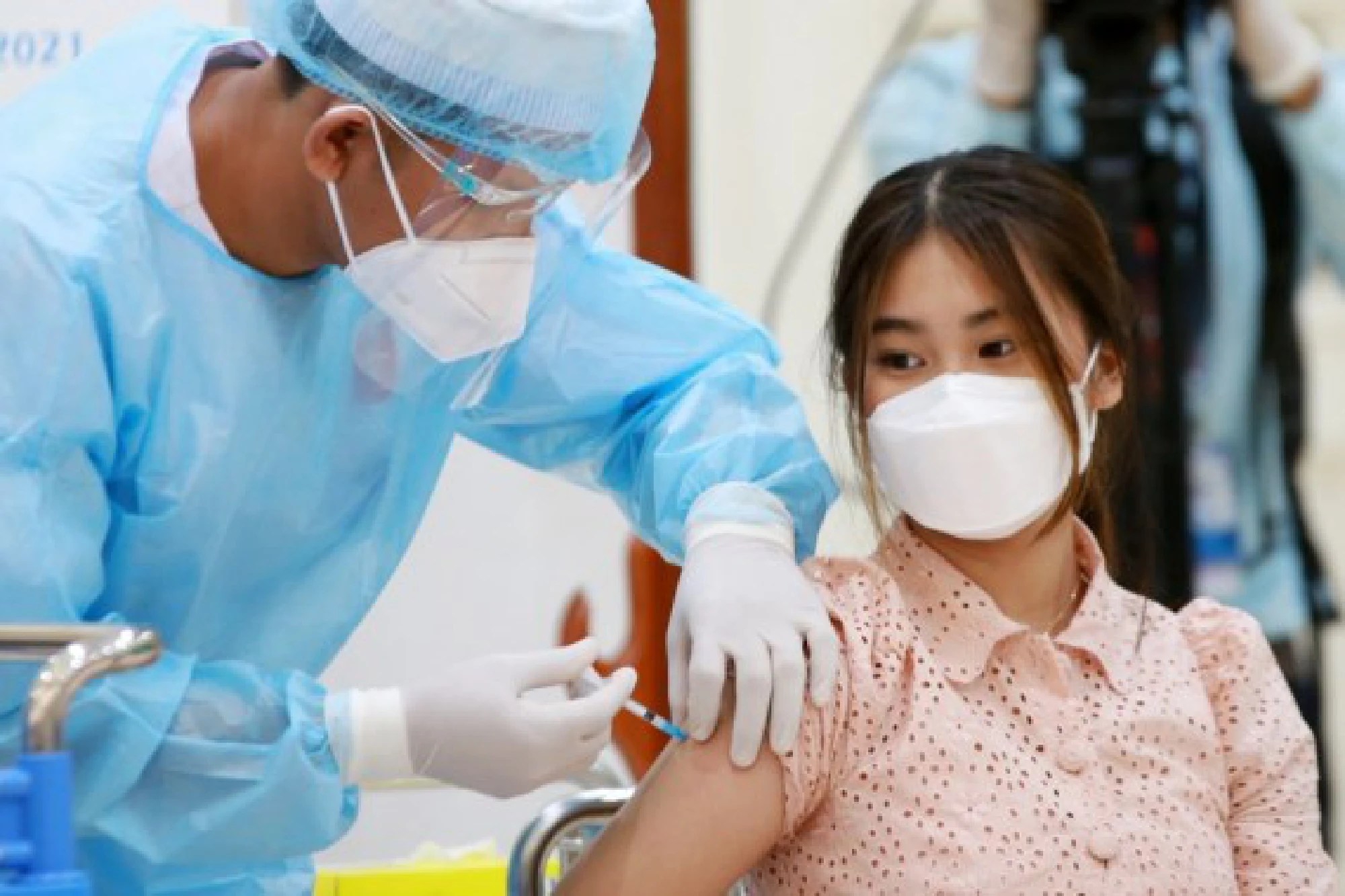 An adolescent receives her first dose of Sinovac COVID-19 vaccine in Phnom Penh, Cambodia, Aug. 1, 2021.