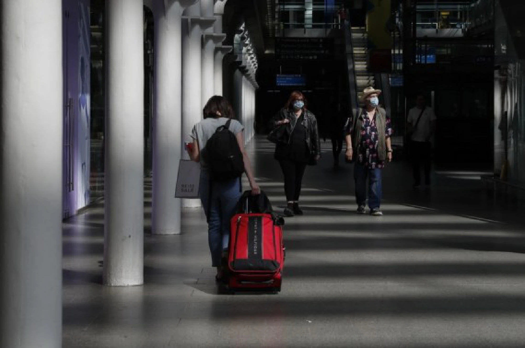 Passengers walk at St. Pancras International Station in London, Britain, July 29, 2021.