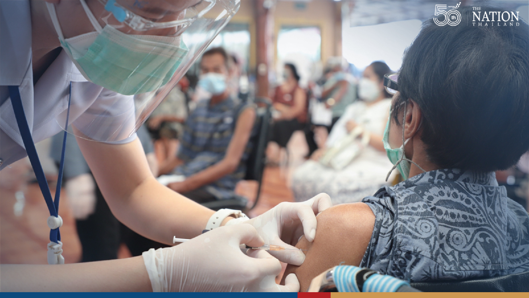 Long queue fails to deter elderly seeking Pfizer vaccine in Samut Prakan