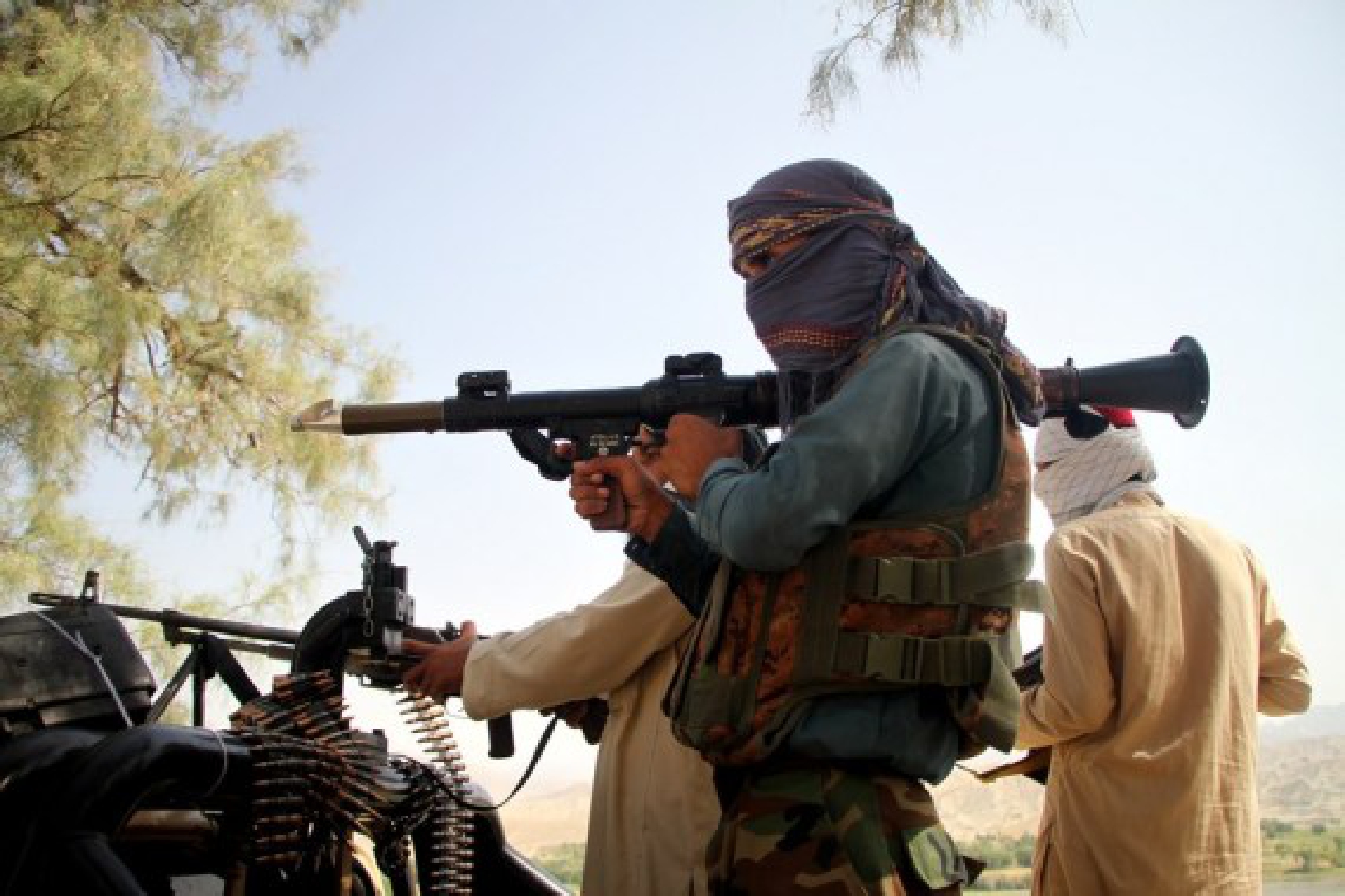 Afghan Taliban fighters are seen at a security checkpoint in Kabul, capital of Afghanistan, Aug. 20, 2021. 