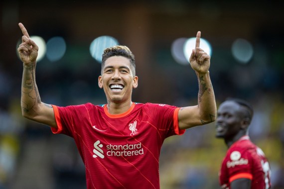  Liverpool's Roberto Firmino celebrates scoring the second goal during the 2021-2022 season English Premier League first round match against Norwich City in Norwich, Britain, on Aug. 14, 2021.