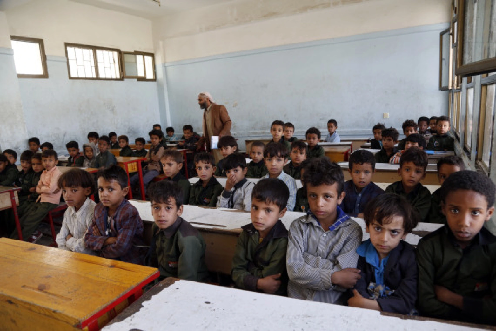 Children attend a class at a school in Sanaa, Yemen, on Sept. 8, 2021.