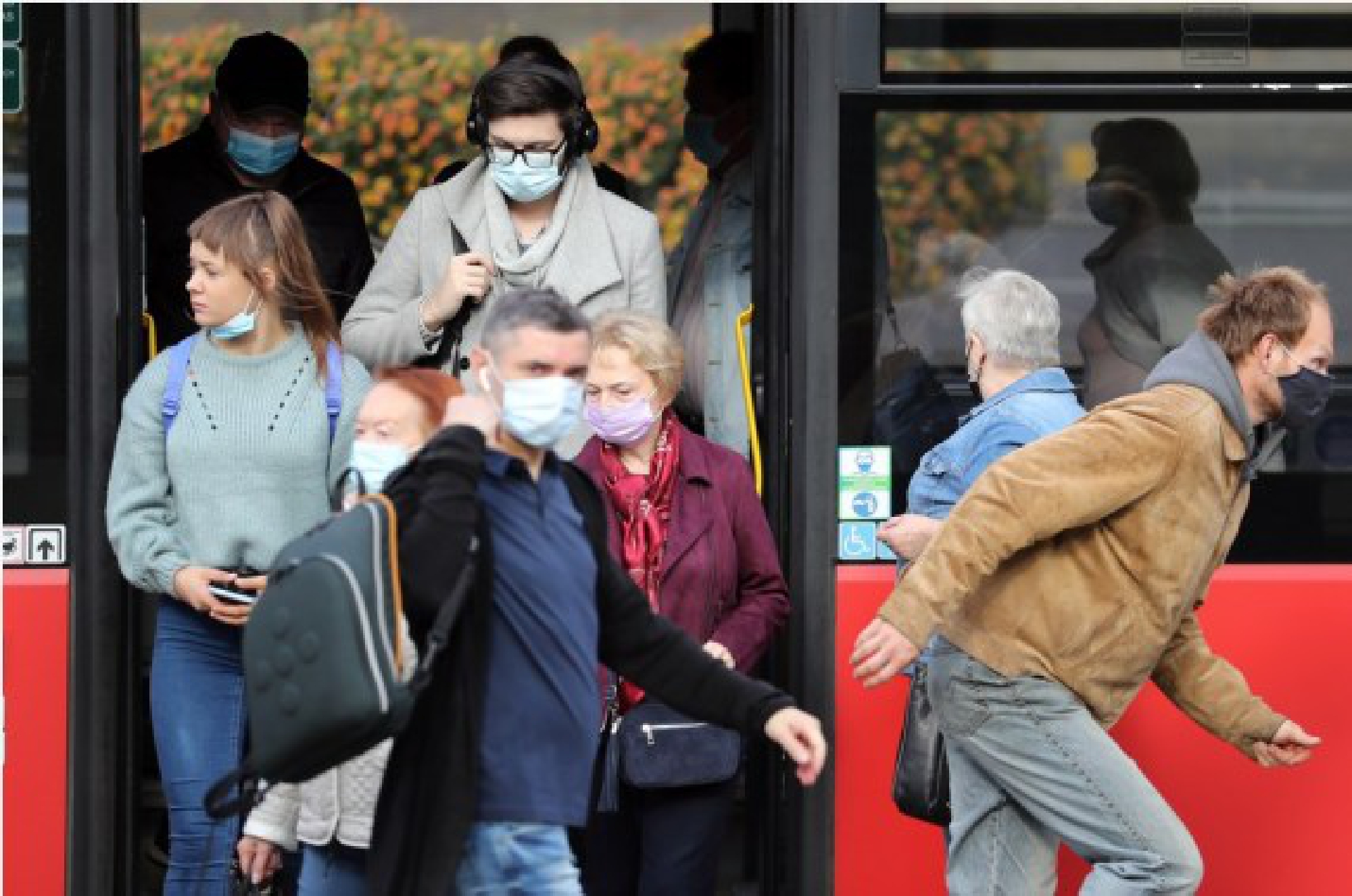  Citizens get off a bus in Vilnius, Lithuania, Sept. 13, 2021.  (Xinhua/Xue Dongmei)