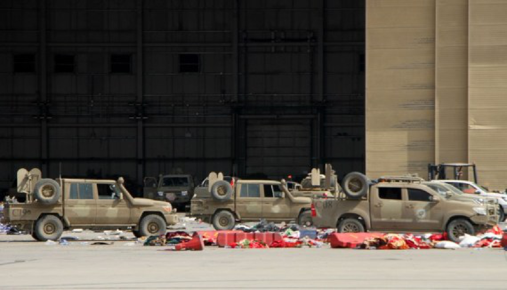 Photo taken on Aug. 31, 2021 shows military vehicles at Kabul airport in Kabul, capital of Afghanistan. 