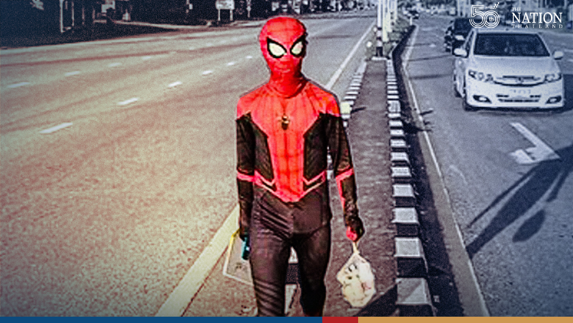 ‘Spider-Man’ swoops on busy junction to net college funds