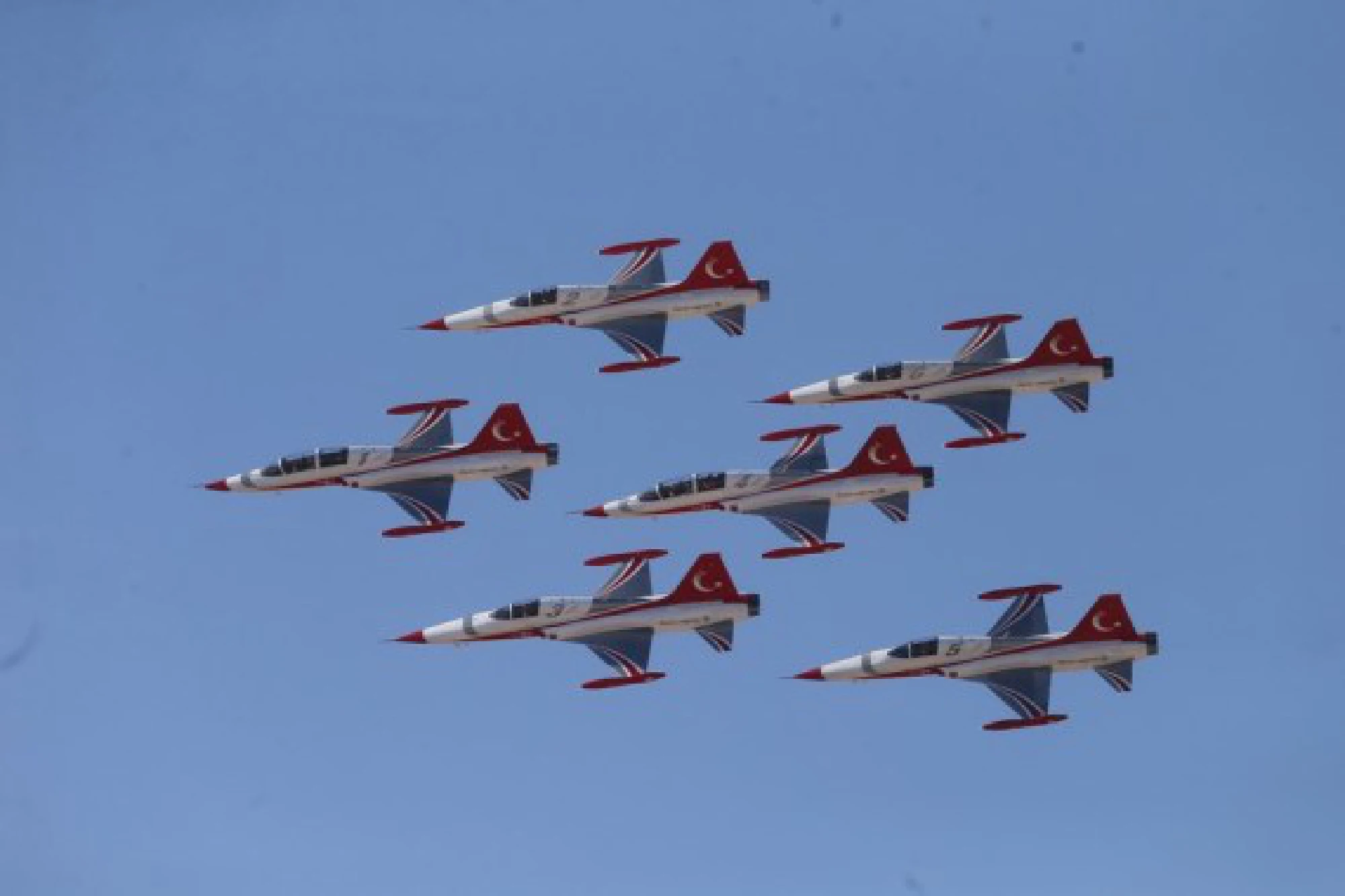 Aircraft perform during the Sivrihisar Airshow 2021 in Sivrihisar district of Eskisehir in Turkey, on Sept. 12, 2021. 