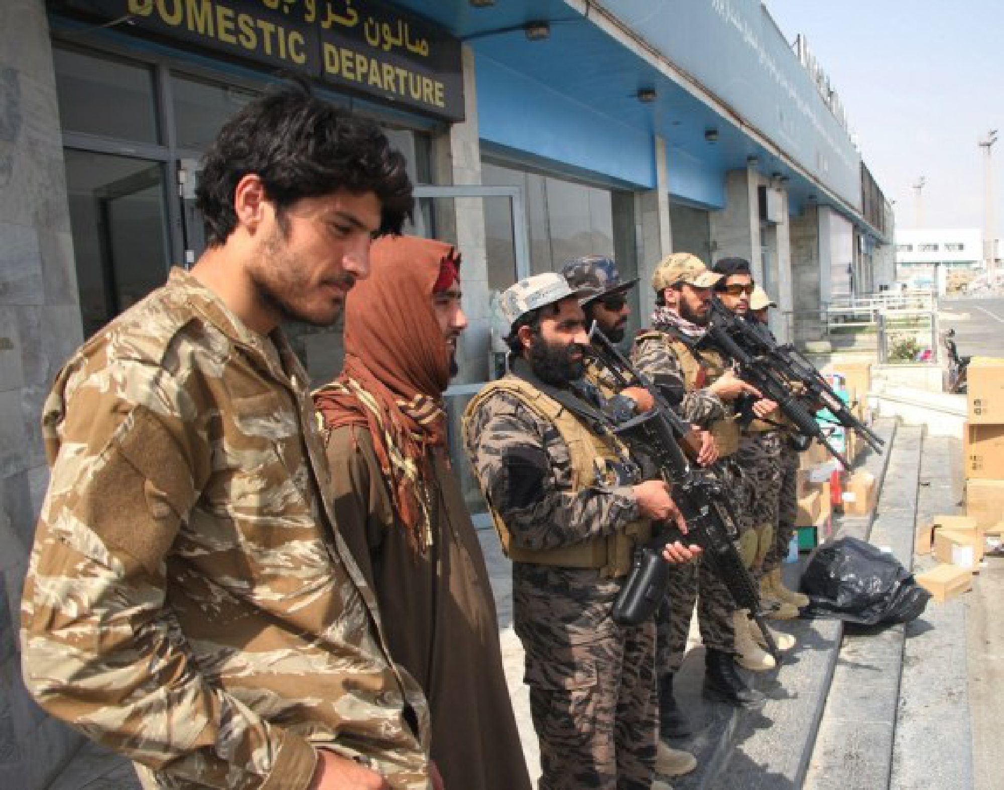 Taliban members are seen at Kabul airport in Kabul, capital of Afghanistan, Aug. 31, 2021. 