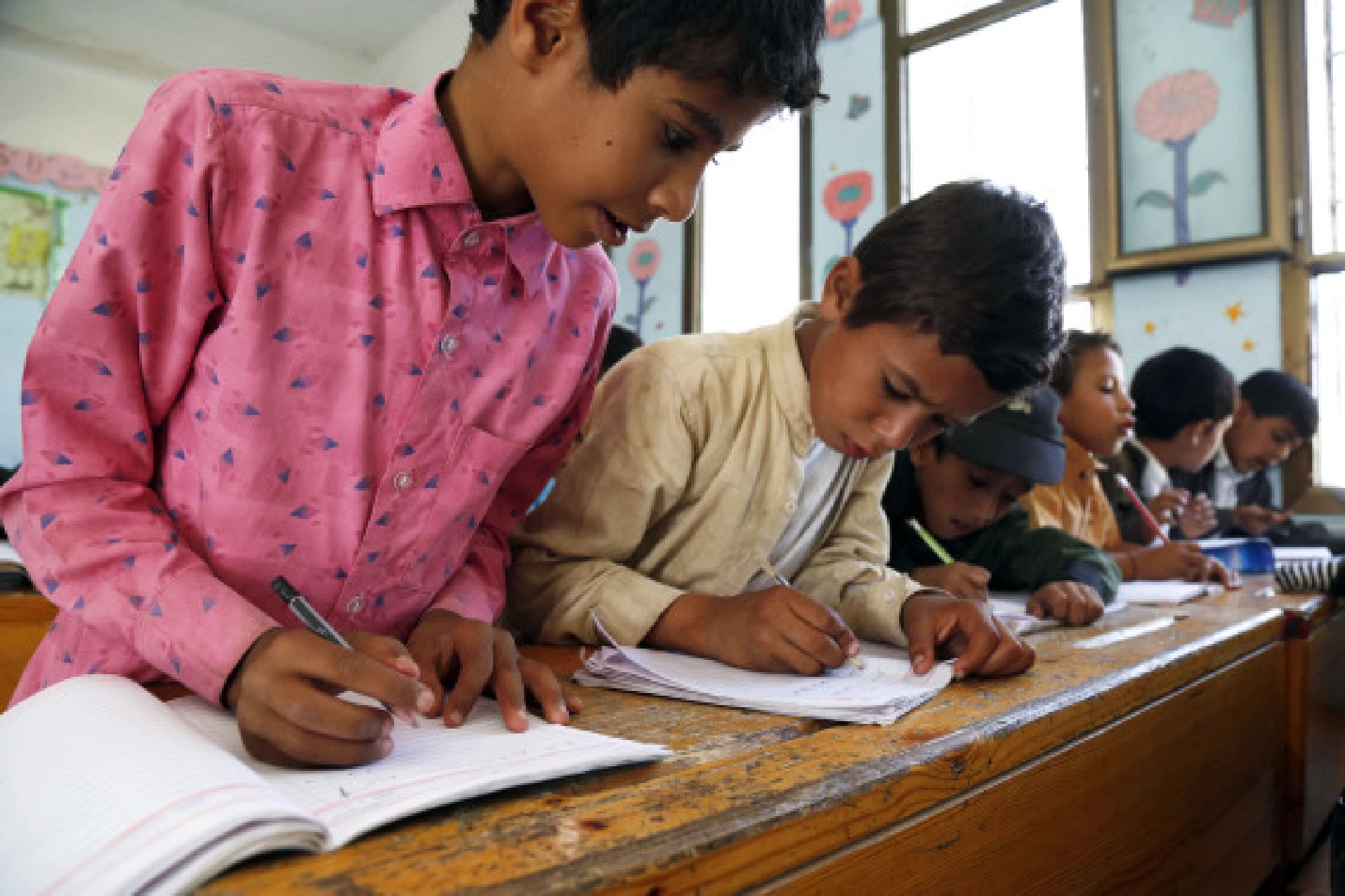 Children attend an Arabic class at a school in Sanaa, Yemen, on Sept. 8, 2021.