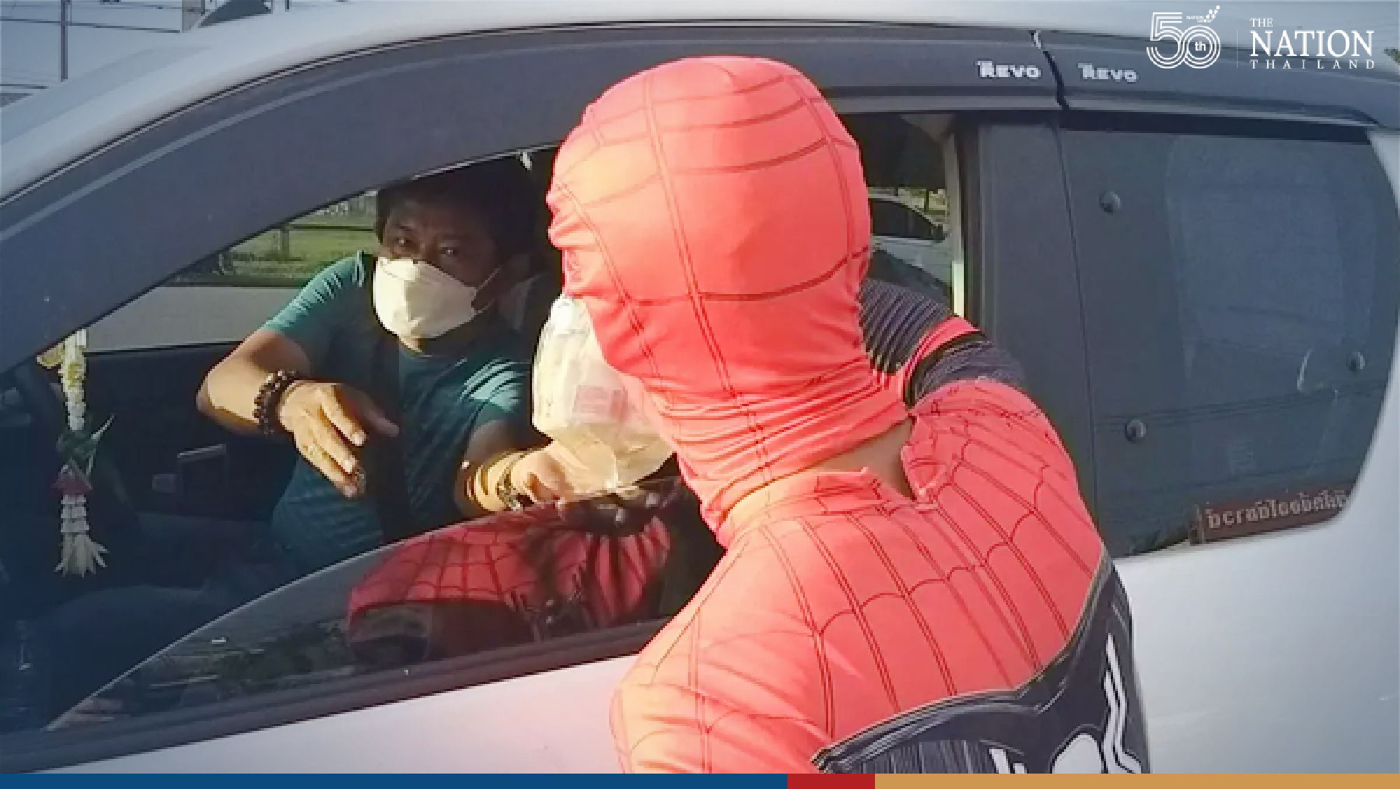 ‘Spider-Man’ swoops on busy junction to net college funds