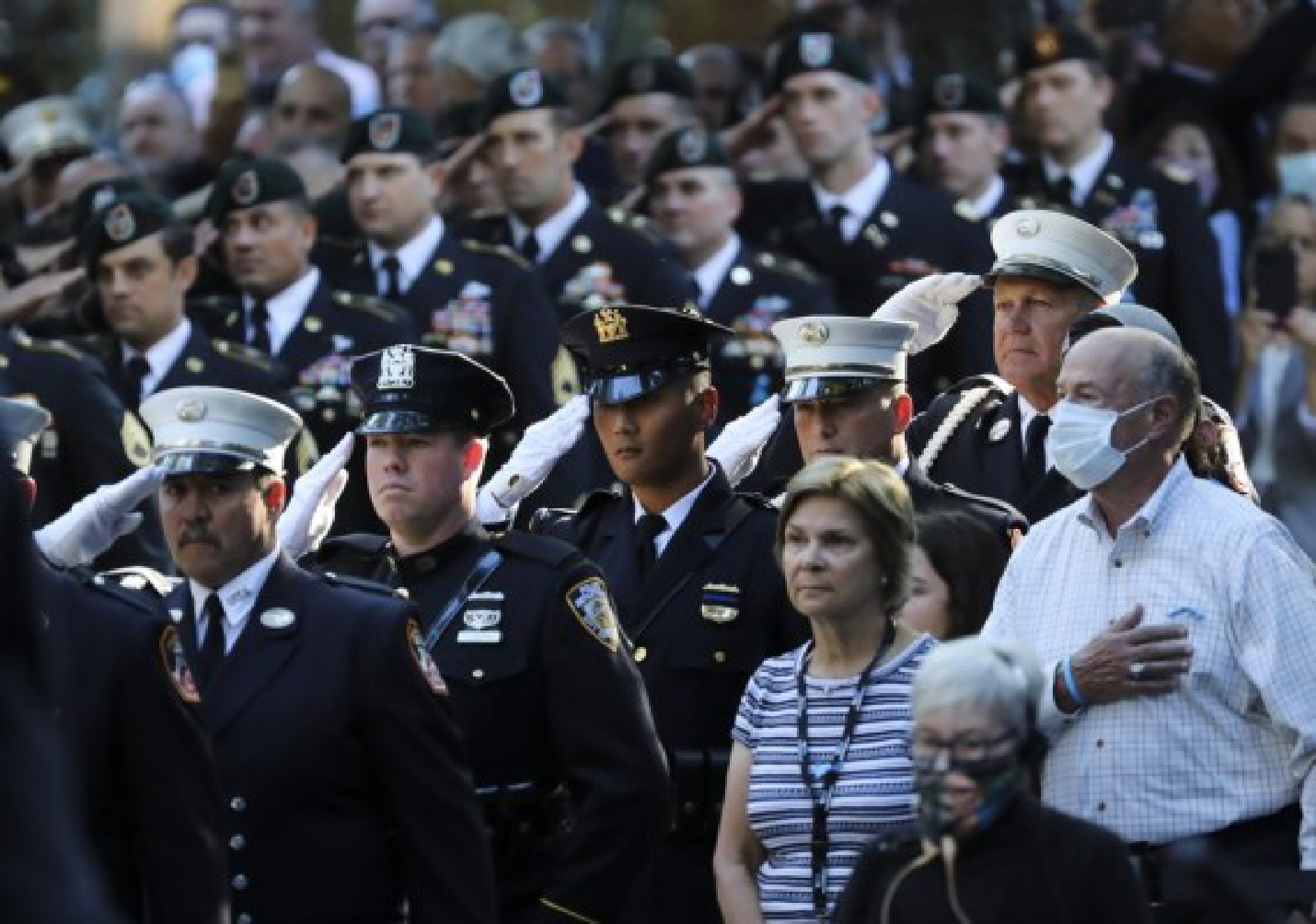 A guard of honor salutes during a commemoration ceremony of the 20th anniversary of the 9/11 attacks in New York, the United States, on Sept. 11, 2021.