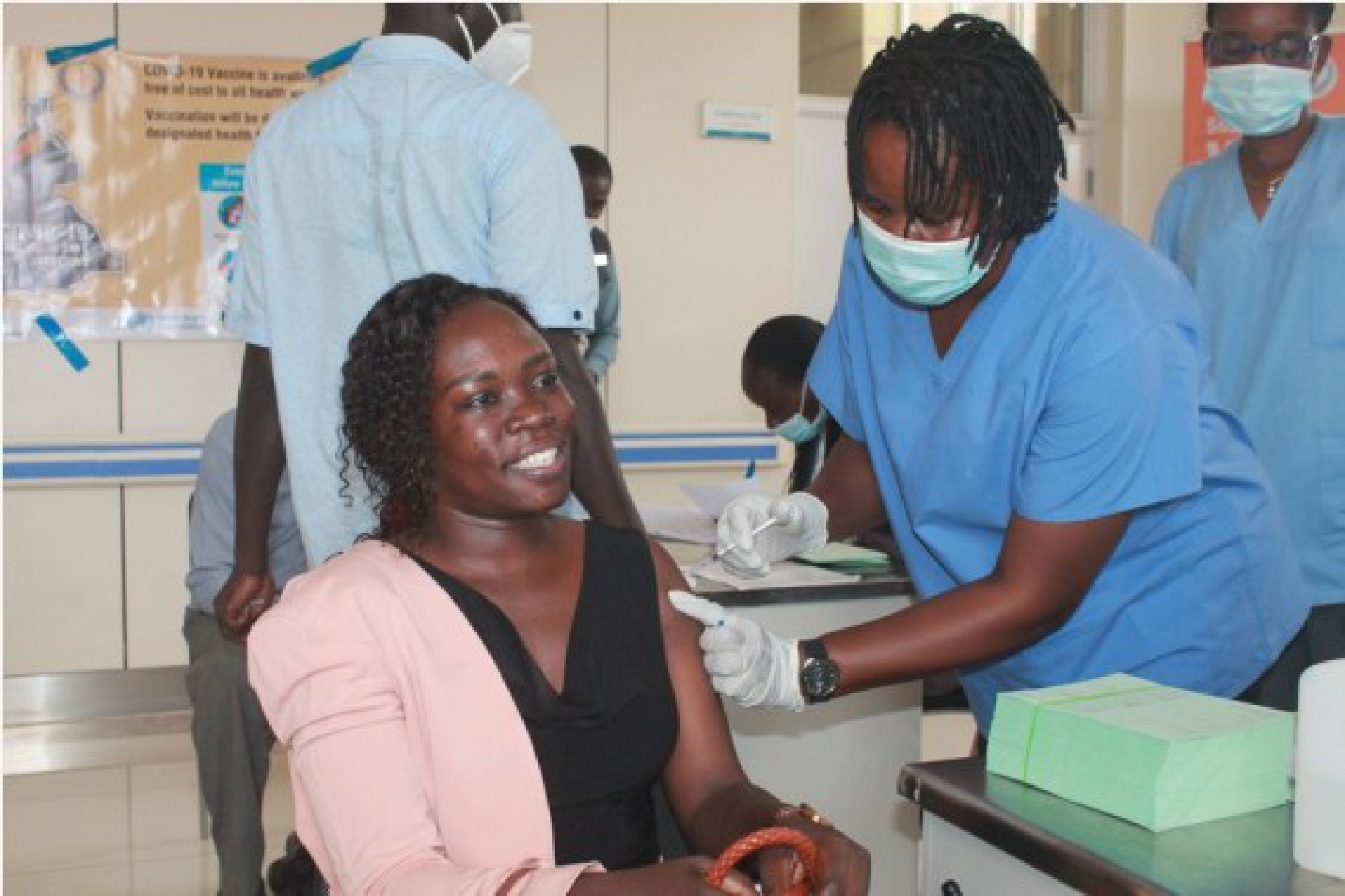 A South Sudanese woman receives AstraZeneca COVID-19 vaccine at Juba Teaching Hospital in Juba, capital of South Sudan, April 7, 2021.