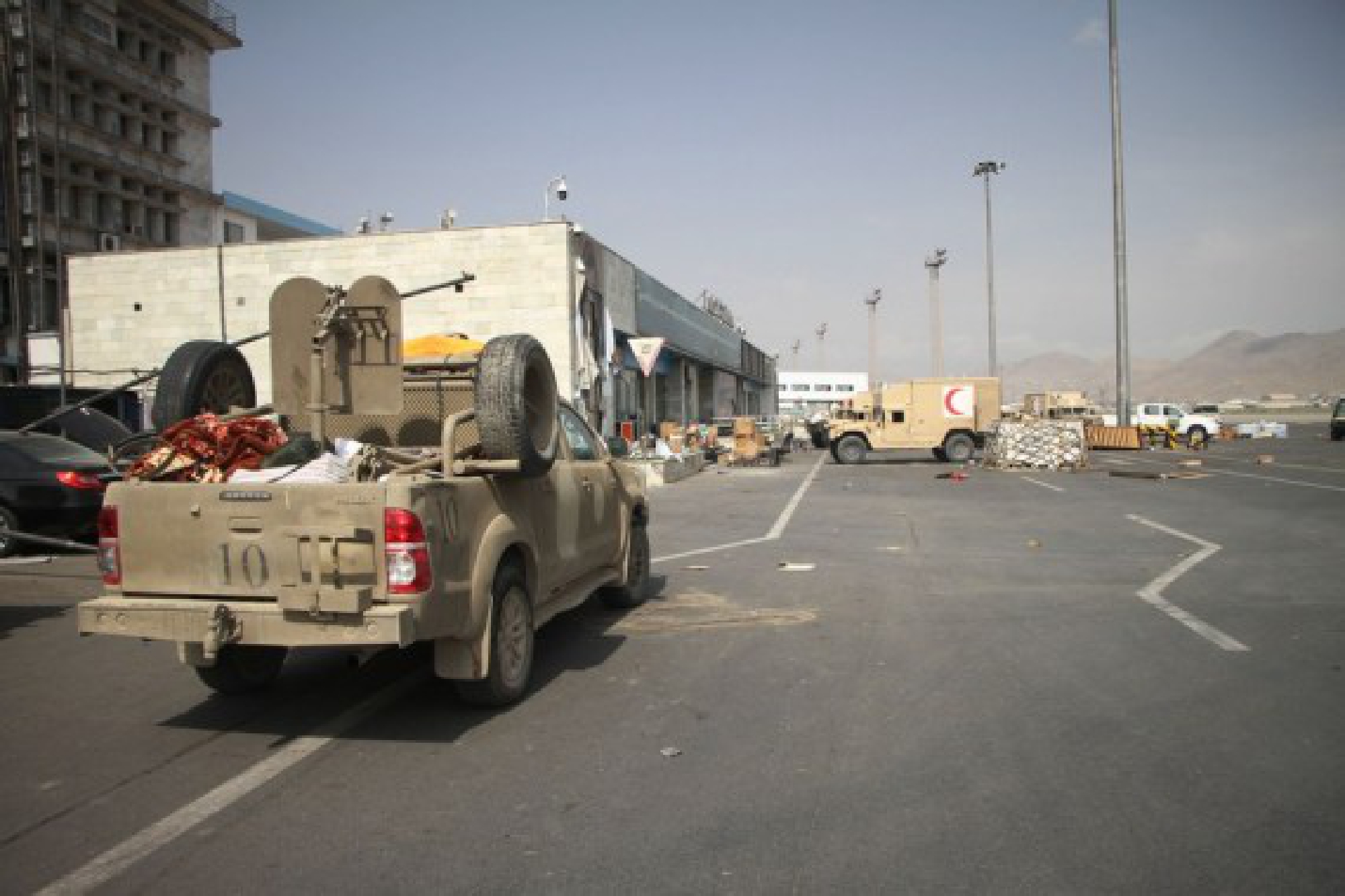 Photo taken on Aug. 31, 2021 shows military vehicles at Kabul airport in Kabul, capital of Afghanistan.