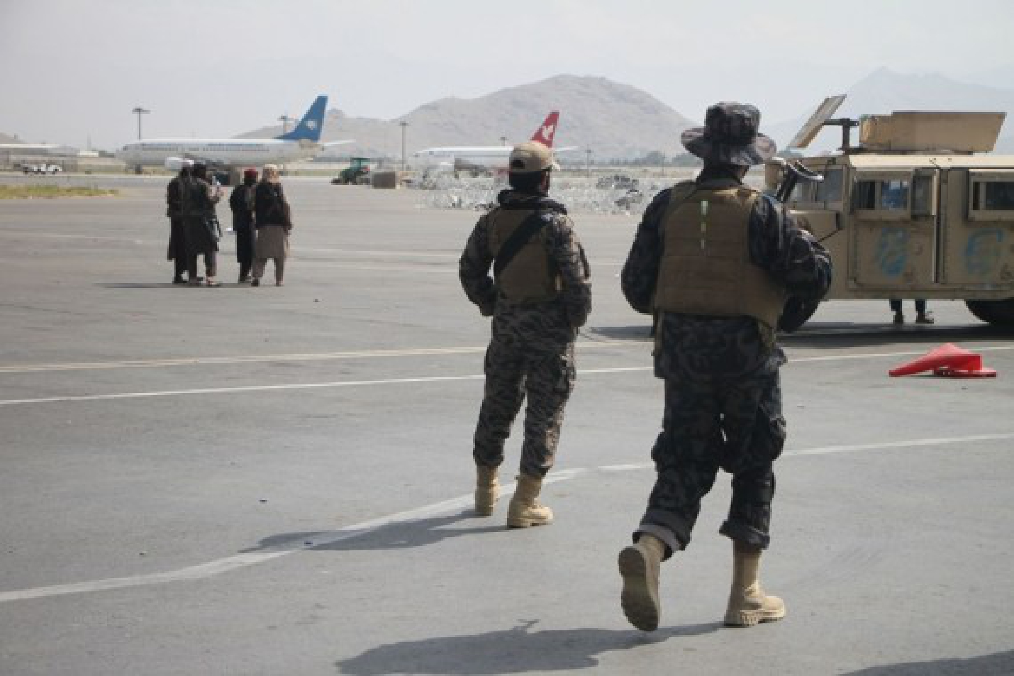 Taliban members are seen at Kabul airport in Kabul, capital of Afghanistan, Aug. 31, 2021.