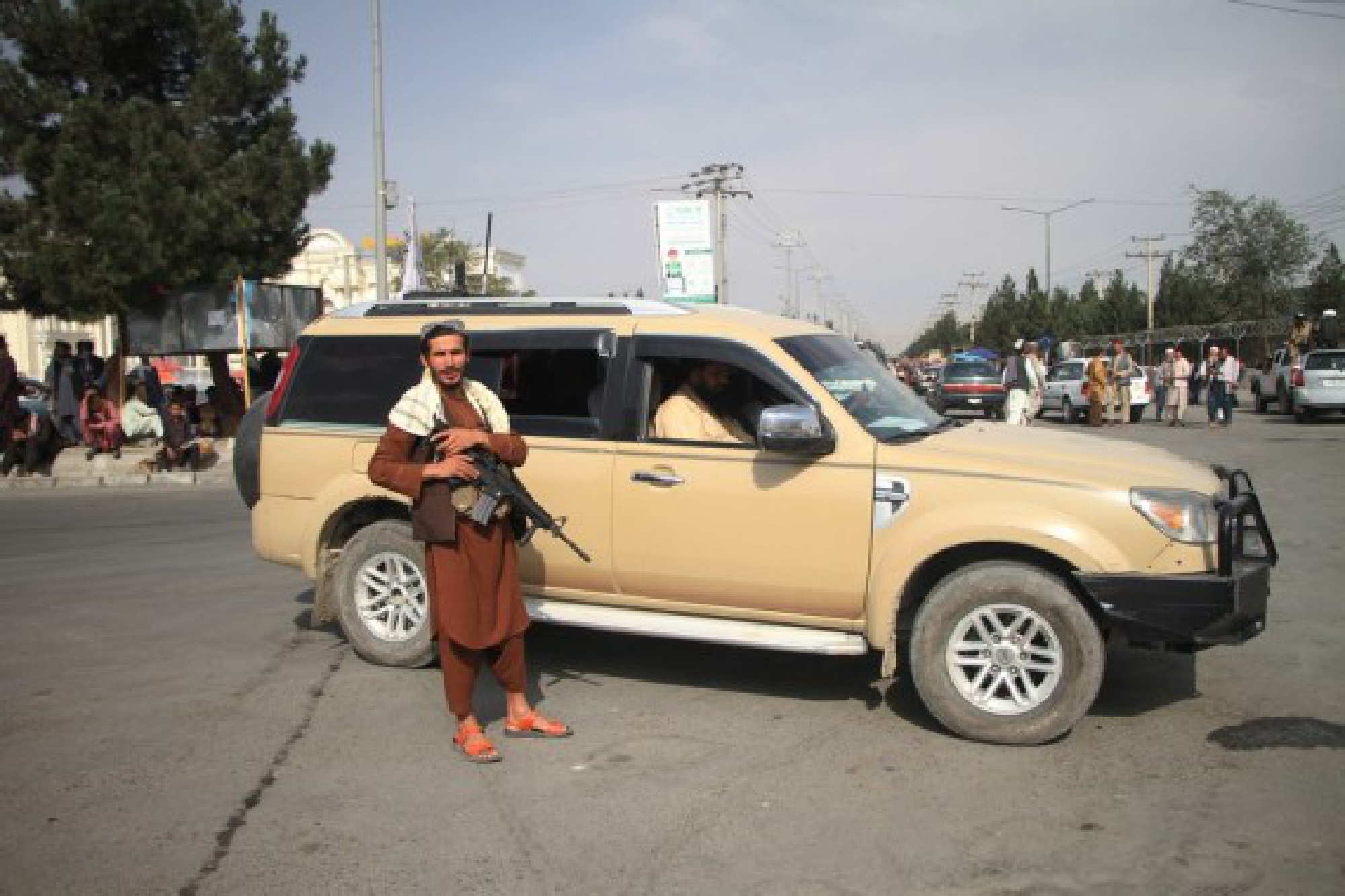 A Taliban member stands guard outside the Kabul airport in Kabul, capital of Afghanistan, Aug. 31, 2021. 