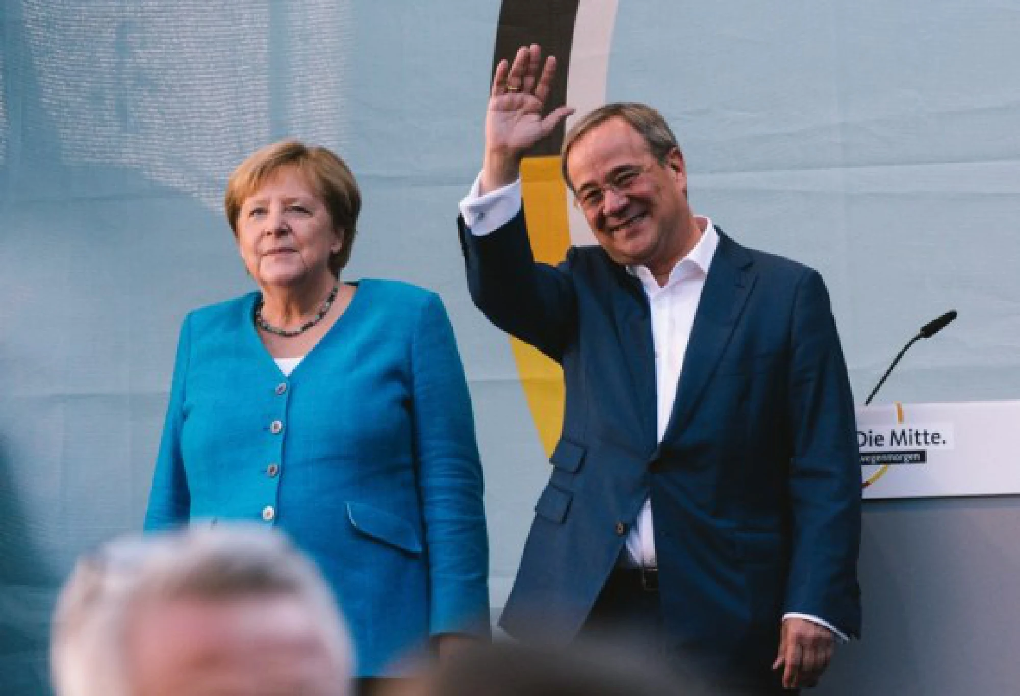 German Chancellor Angela Merkel (L) and Armin Laschet, leader of German Christian Democratic Union (CDU) and chancellor candidate of CDU/Christian Social Union (CSU), attend an election rally of CDU for Germany's federal elections in Aachen, Germany, Sept. 25, 2021. (Photo by Tang Ying/Xinhua)