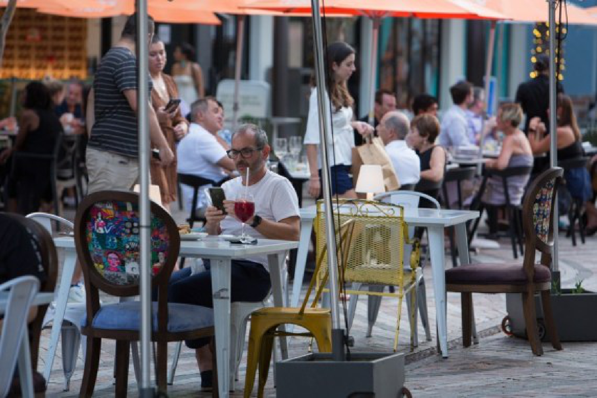 Guests dine outside in Coral Gables near Miami, Florida, the United States, Aug. 11, 2021.