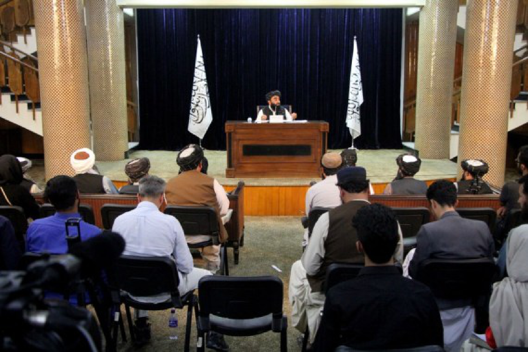 Taliban spokesman Zabihullah Mujahid (Rear) speaks during a press conference in Kabul, Afghanistan, on Sept. 7, 2021.