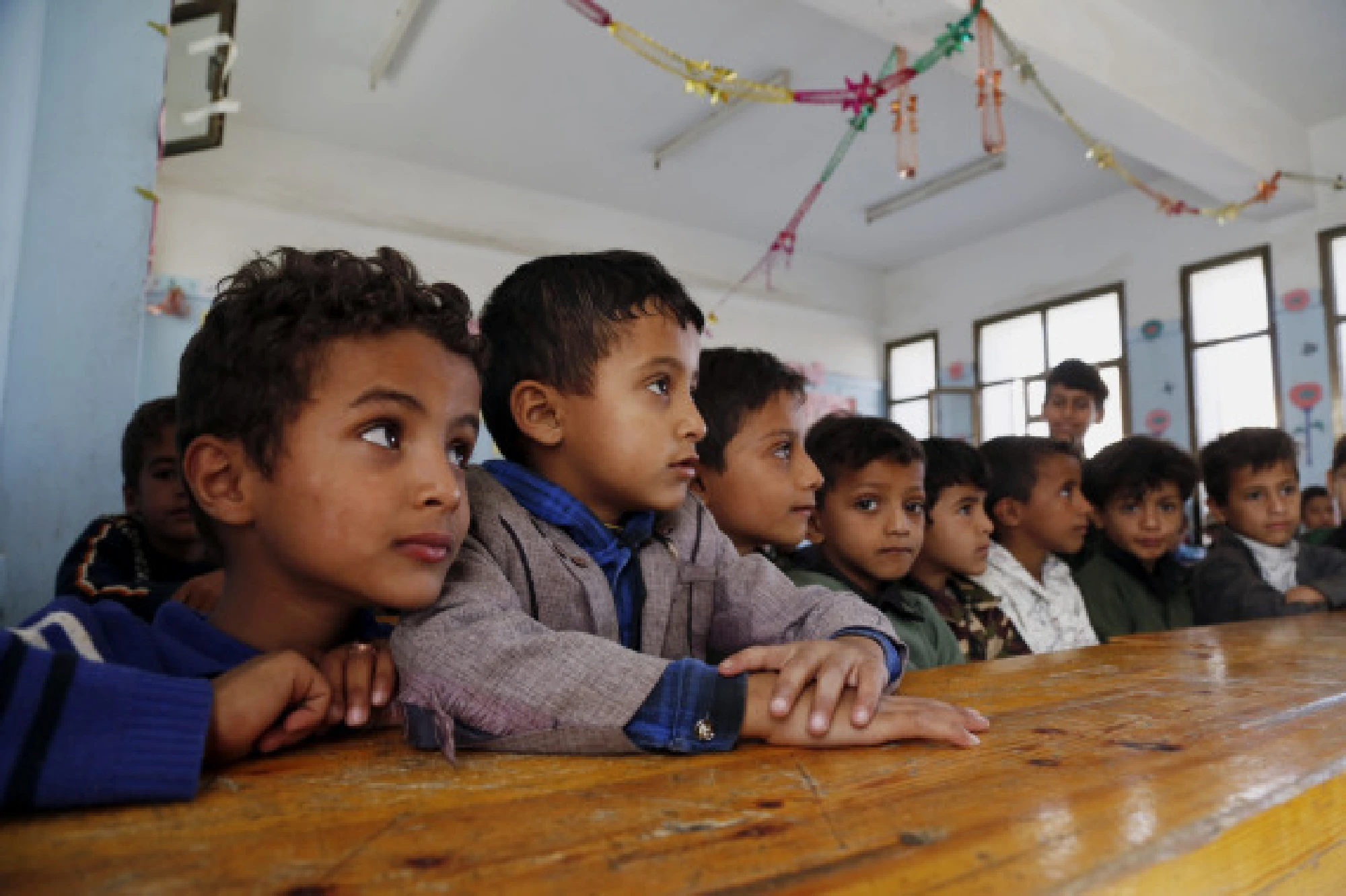 School children attend Arabic class at a school in Sanaa, Yemen on Sept. 8, 2021. 
