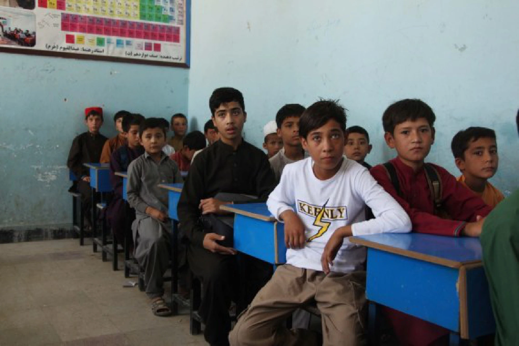Afghan school students attend a classroom at a local school after the Taliban have taken control of the country in Kunduz province, Afghanistan, Aug. 22, 2021.
