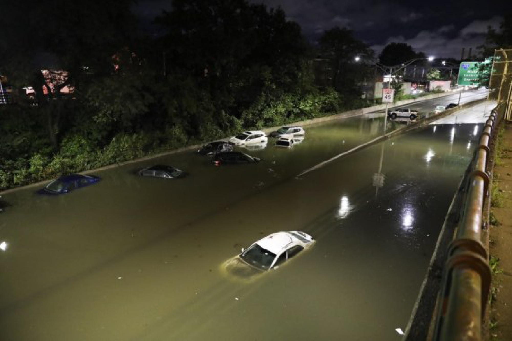 Vehicles are submerged on a waterlogged road in New York, the United States, Sept. 2, 2021.