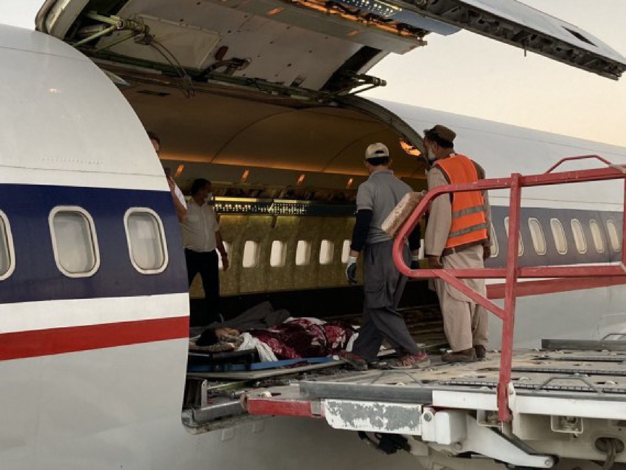 An airplane is about to transfer people injured in terrorist attacks to Iran for medical treatment, in Kandahar city, southern Afghanistan, Oct. 18, 2021. (Photo by Arghand/Xinhua)