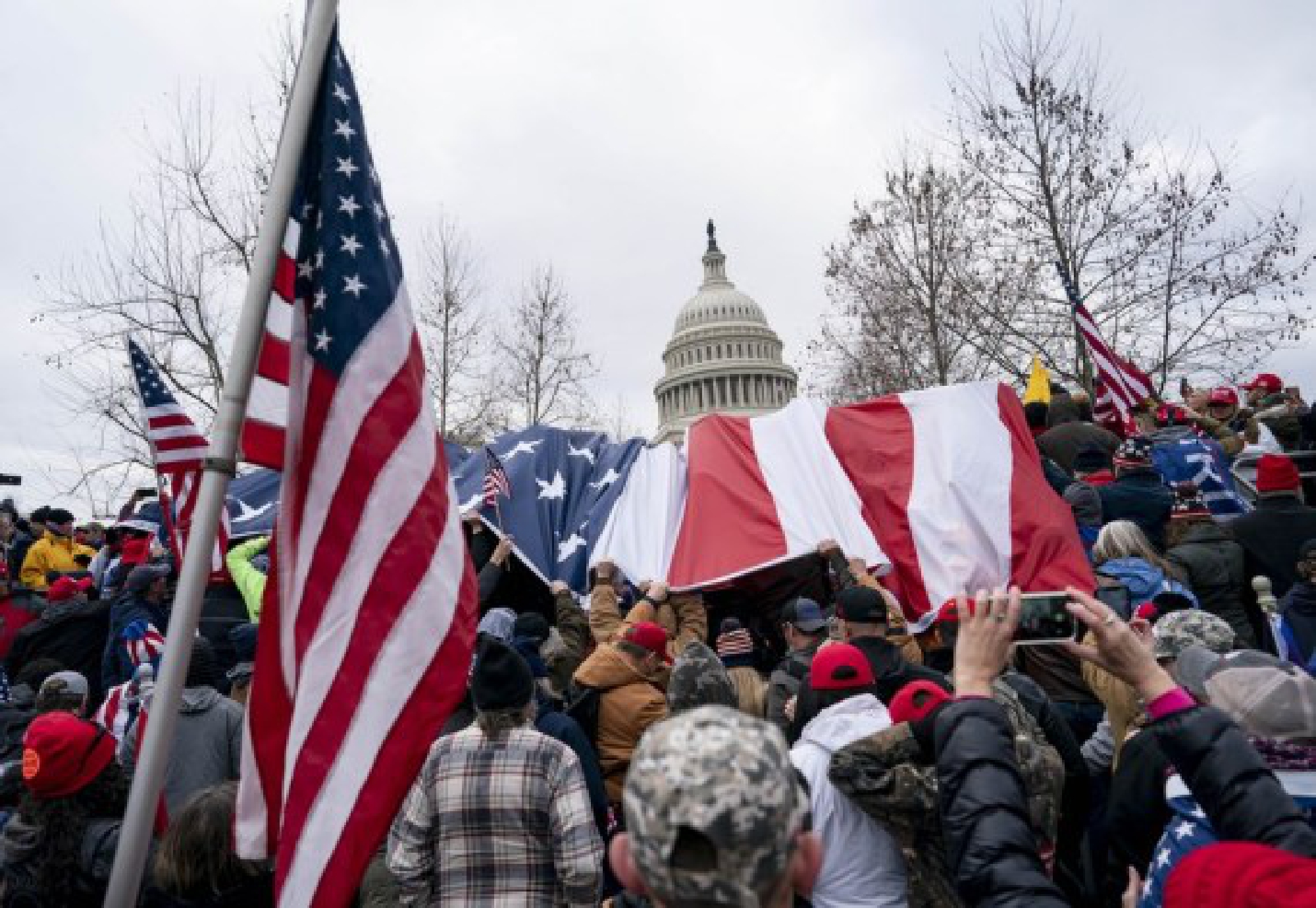 File photo taken on Jan. 6, 2021 shows supporters of U.S. President Donald Trump gathering near the U.S. Capitol building in Washington, D.C., the United States. (Xinhua/Liu Jie)